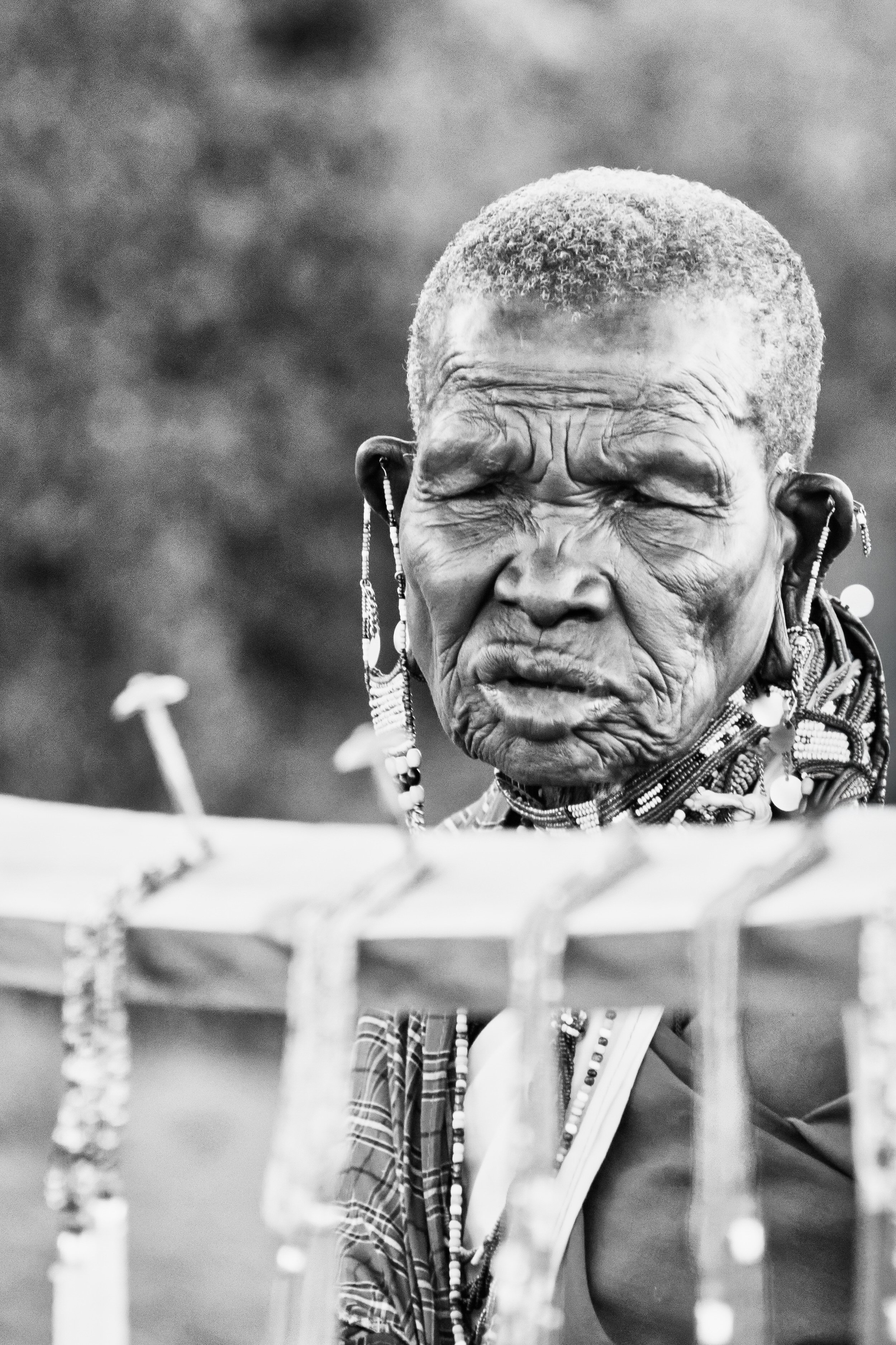 Old Maasai woman in the Masai Mara, Kenya.