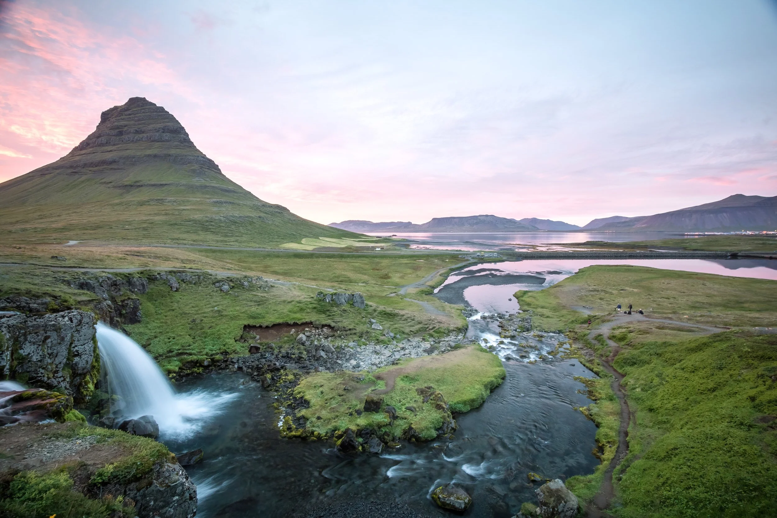 Kirkjufellsfossi on the Snaefellsnes Peninsula, Iceland at midnight in Midsummer.