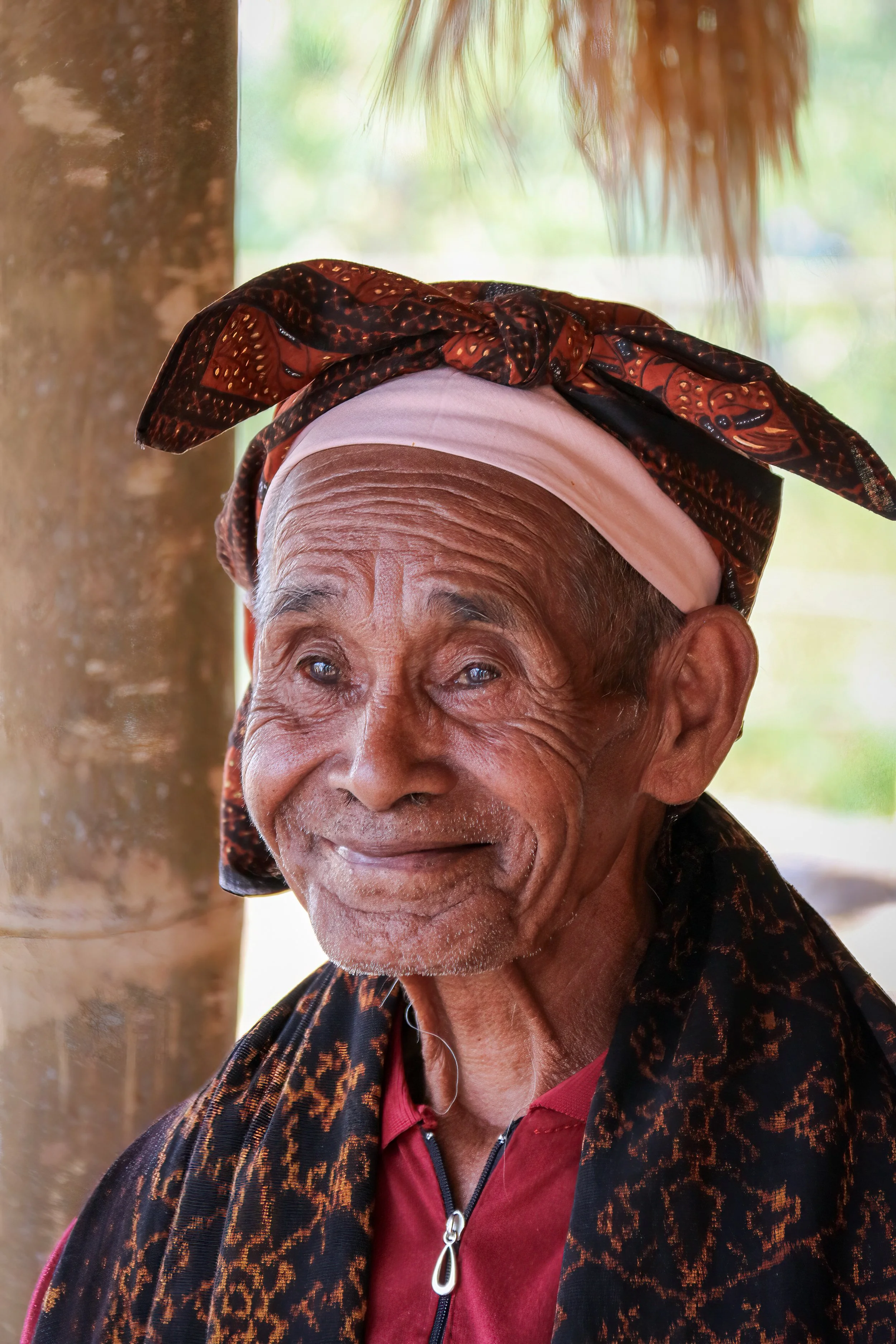 Old woman at remote Takpala village, Flores Island, East Timor.