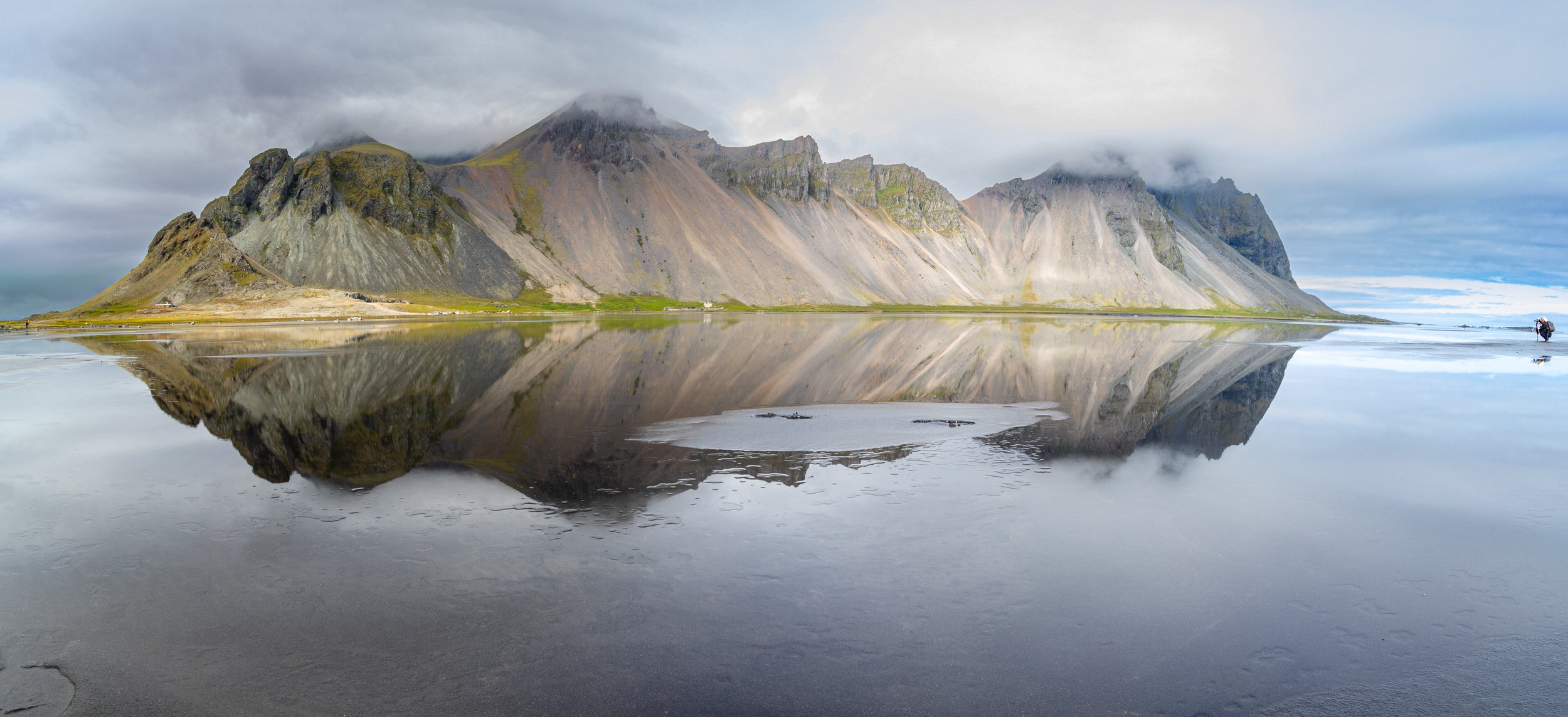 Reflections & Vestrahorn Mountain from the beach at Stokksnes Peninsula, Southeast Iceland.