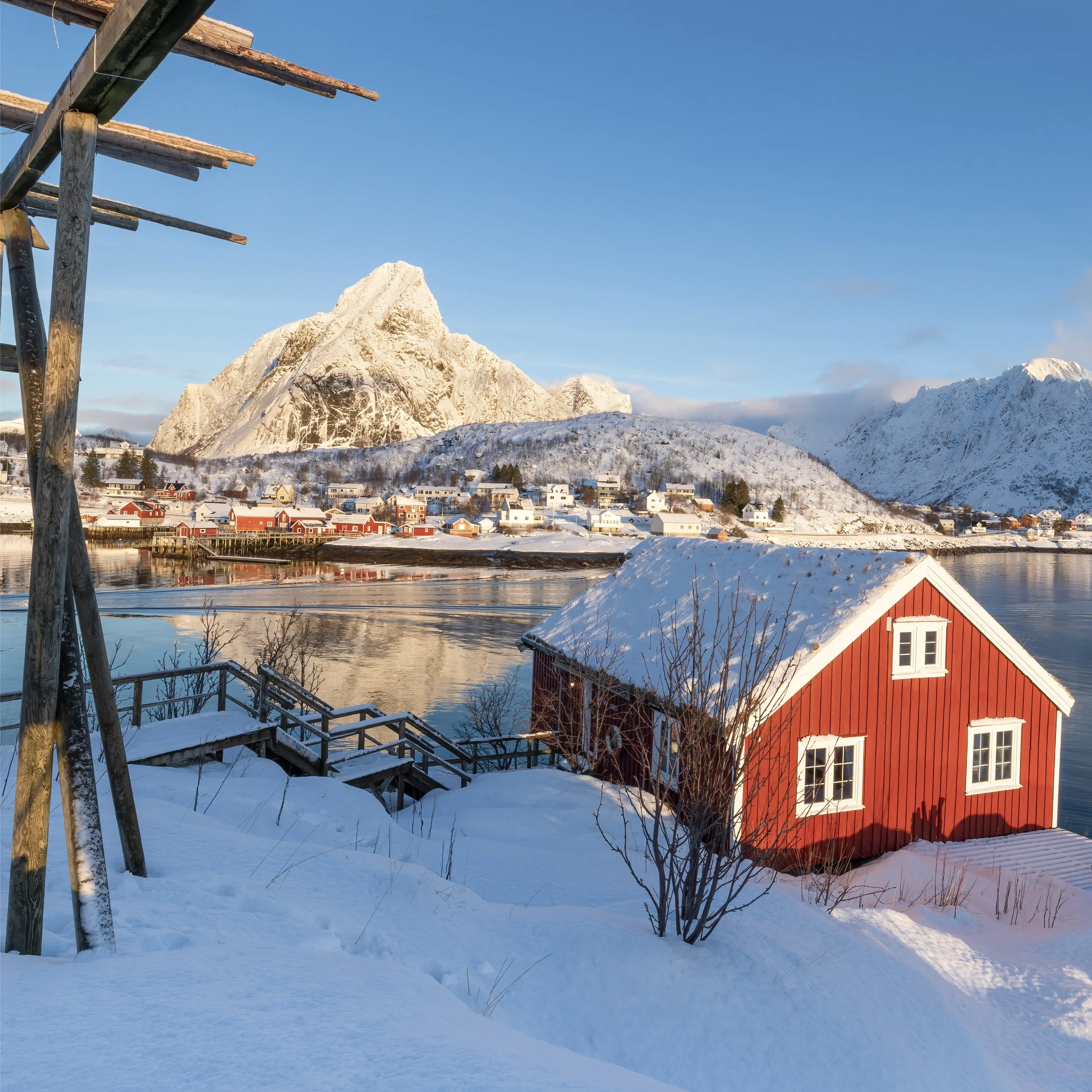 Reine rorbuer cod racks and cabins at Sunset in the Lofoten Islands, Norway.