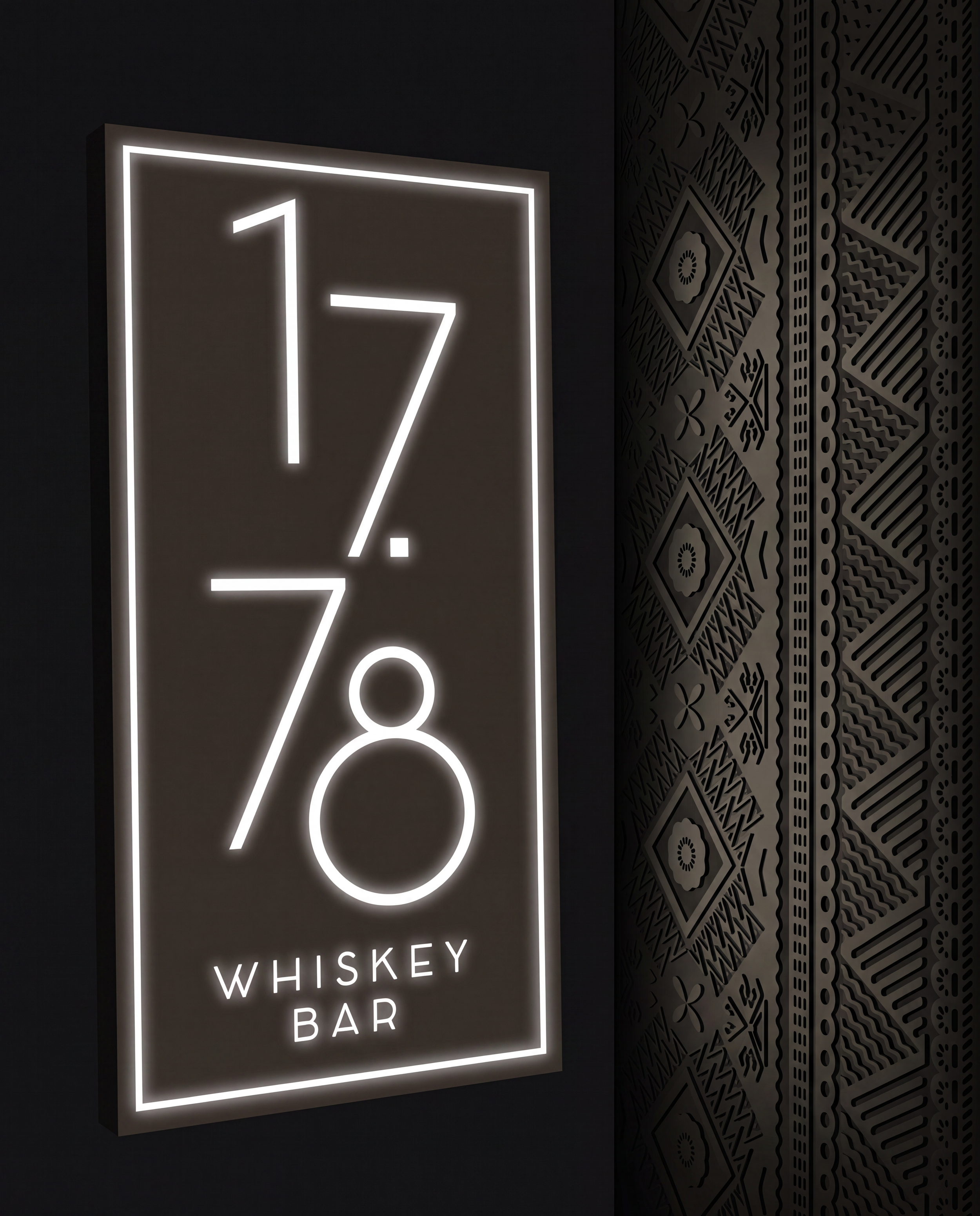 Neon sign reading 'Whiskey Bar' with a large number 7 on a dark wall with intricate patterned design.