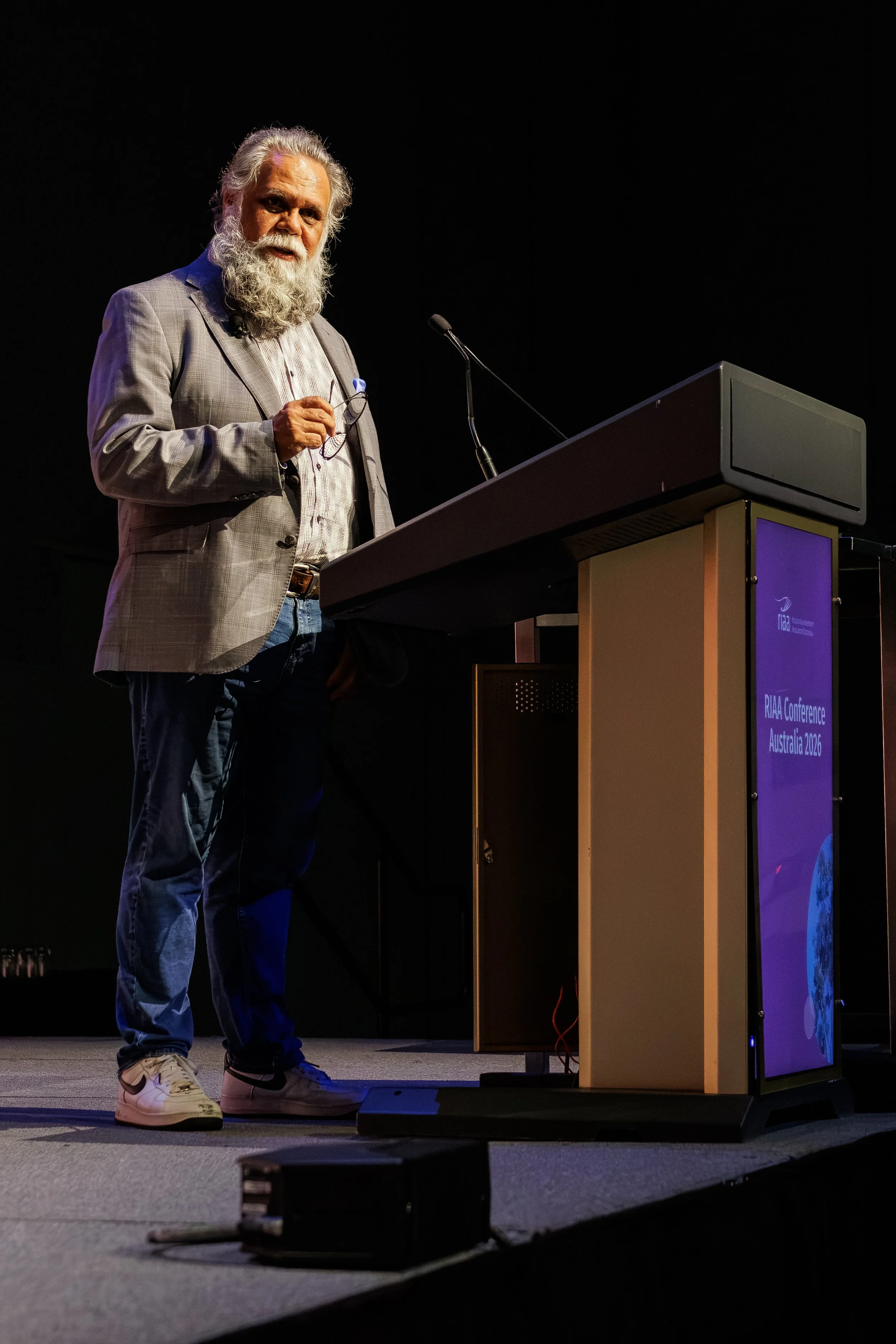 An Aboriginal elder giving a welcome to country at the RIAA Conference at the MCEC.