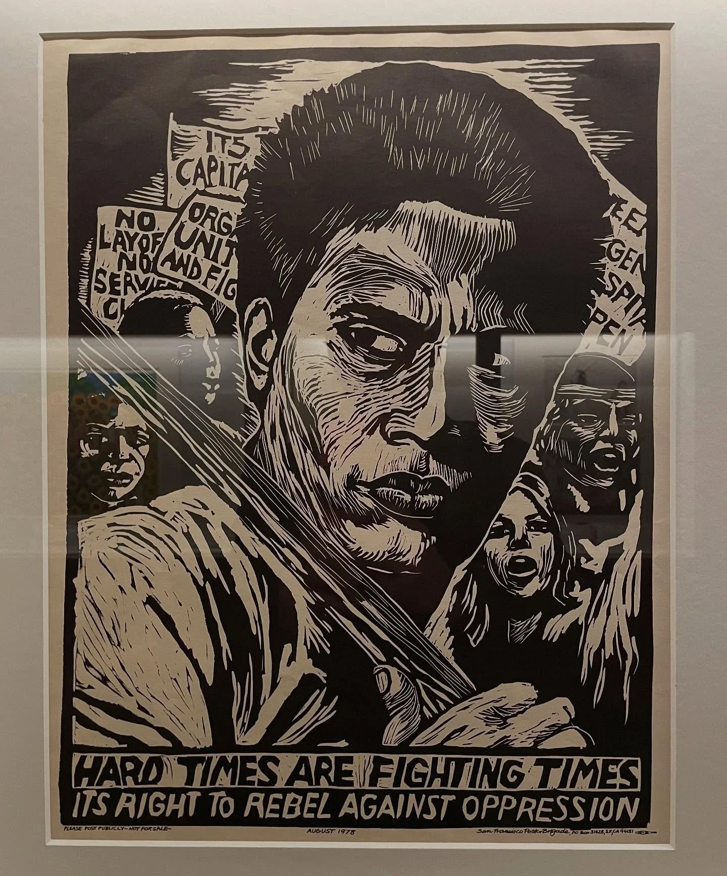 "Hard Times are fighting times - its [sic] right to rebel against oppression". Linocut poster by Rachael Romero for the San Francisco Poster Brigade. USA, 1978.