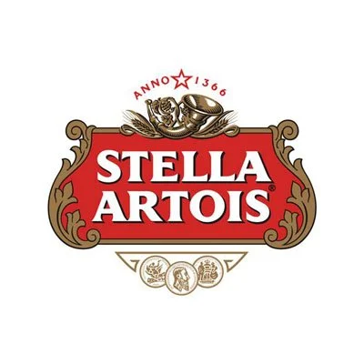 Stella Artois logo featuring the brand name on a red background with ornate gold design and a lion holding a horn at the top.