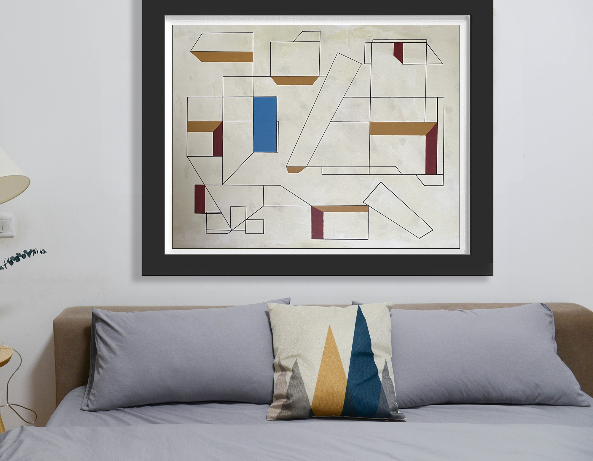 Modern bedroom with a cartoon-style abstract painting above the bed, gray bedding, decorative pillows, and a white bedside table with a small lamp.