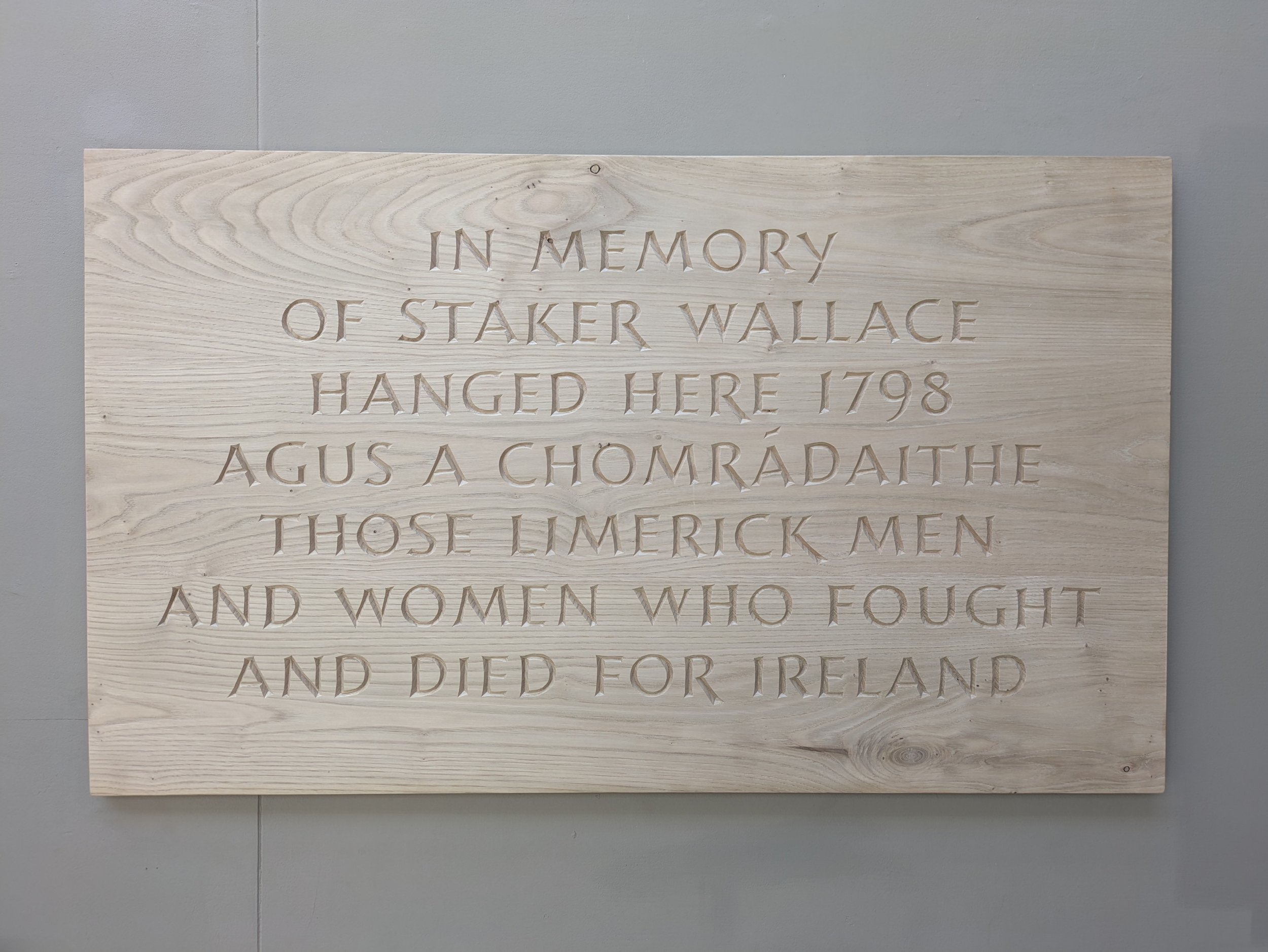 'Staker' Wallace memorial plaque. Chestnut, 64 x 109 cm