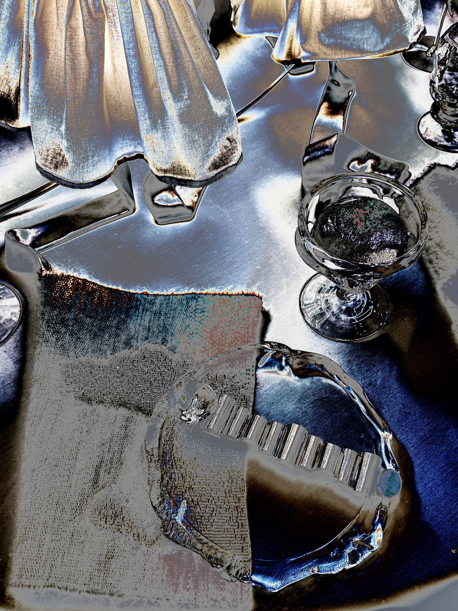 A table set with a crumpled cloth, a glass bowl, and utensils on a reflective surface, with an altered or stylized appearance.