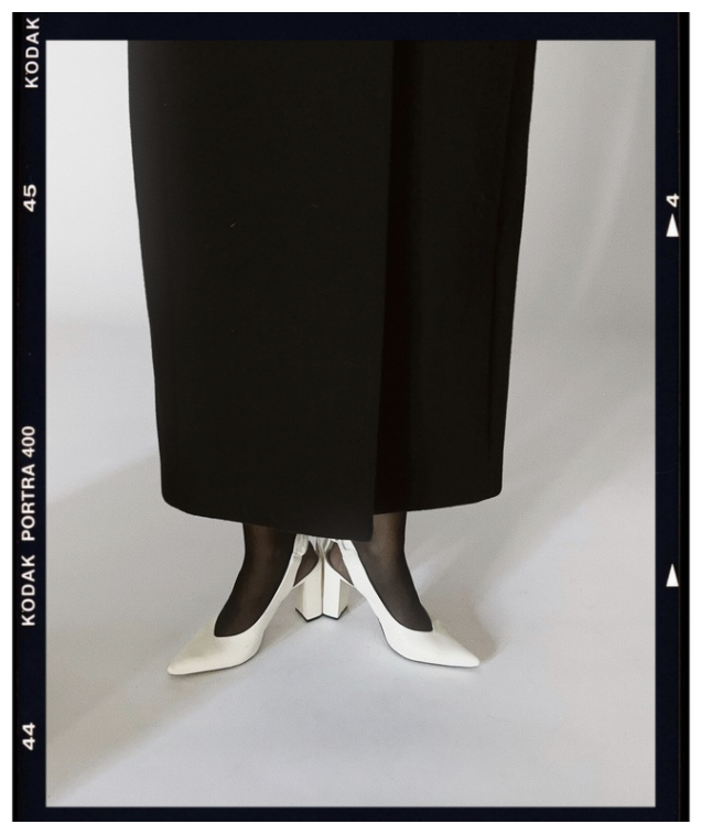 Black skirt and white scarpin crop fashion editorial