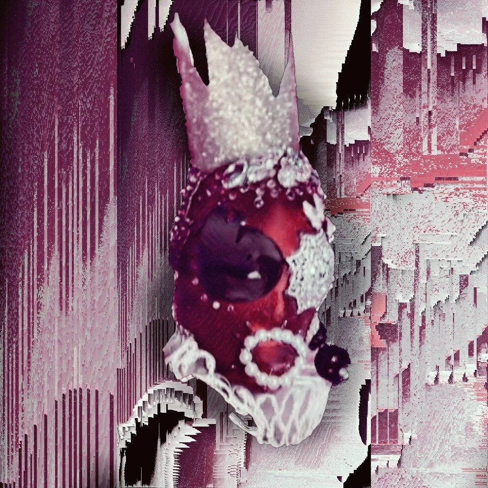 A close-up image of a decorated skull with a red background and digital glitch effects.