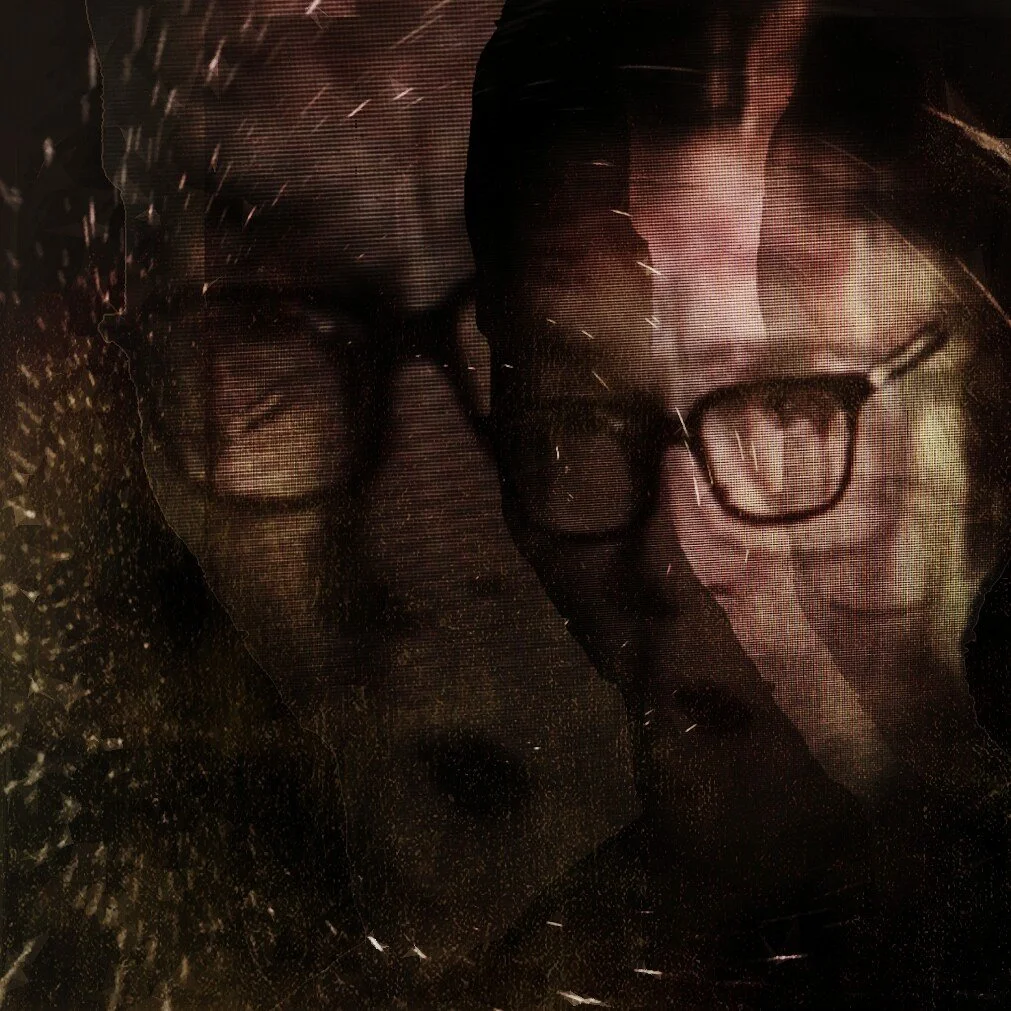 Close-up of two people with glasses, distressed or crying, behind a shattered glass surface.