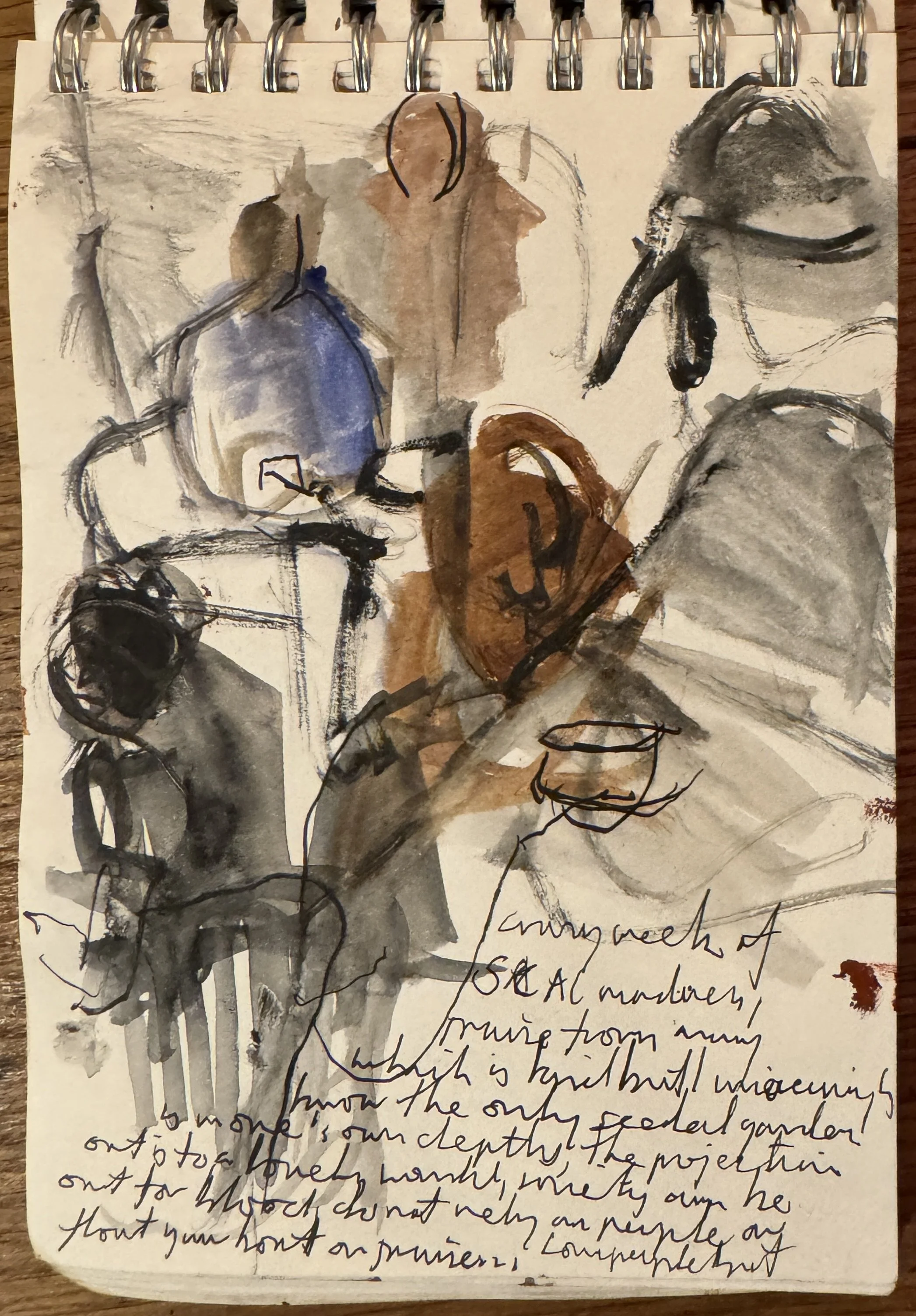 A sketchbook page with a watercolor and ink drawing of abstract human figures and faces, and handwritten notes. The artwork features loose, expressive lines and washes of black, gray, blue, and brown paint, with some details outlined in black ink.