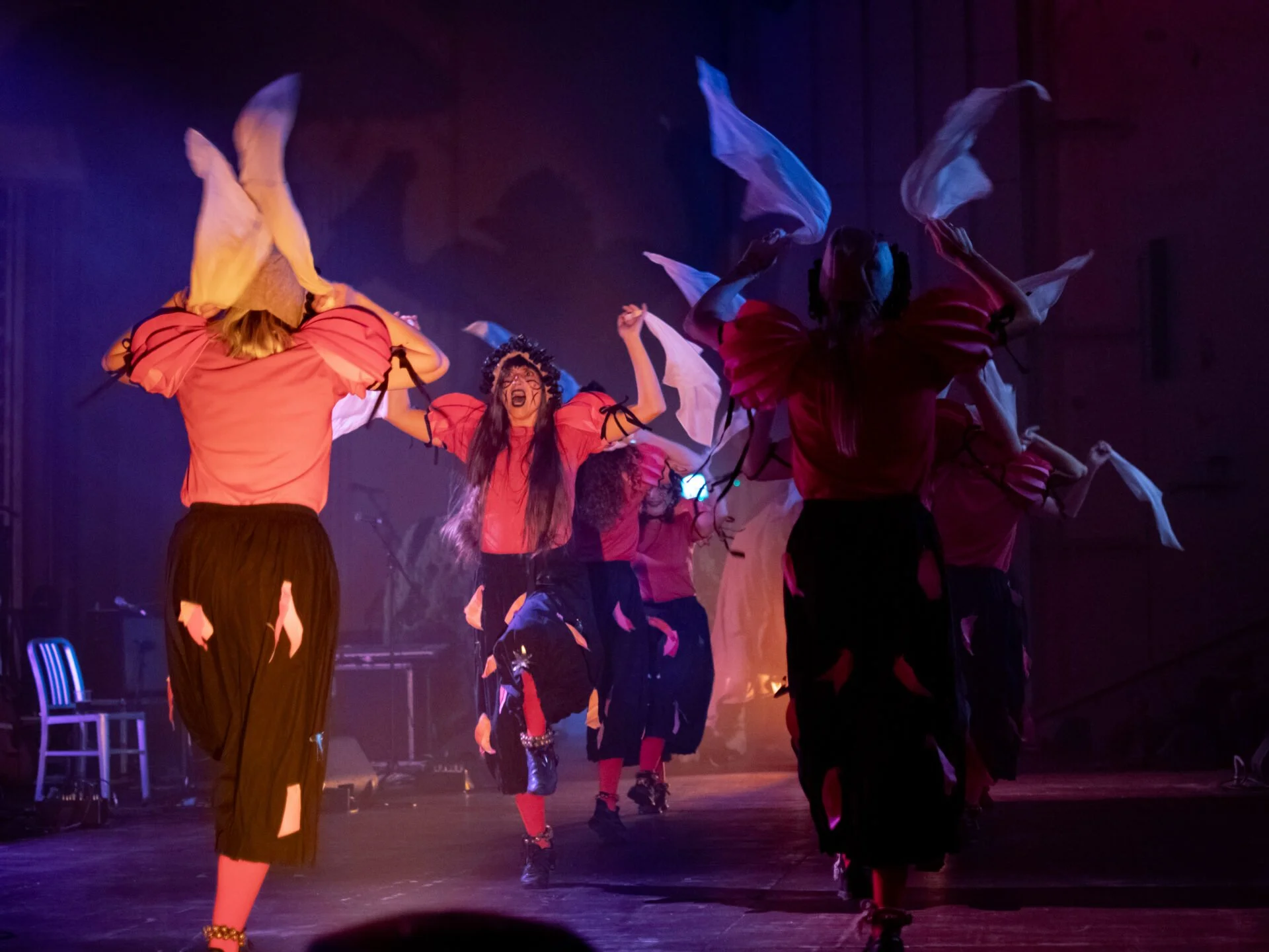 A group of intense looking female morris dancers