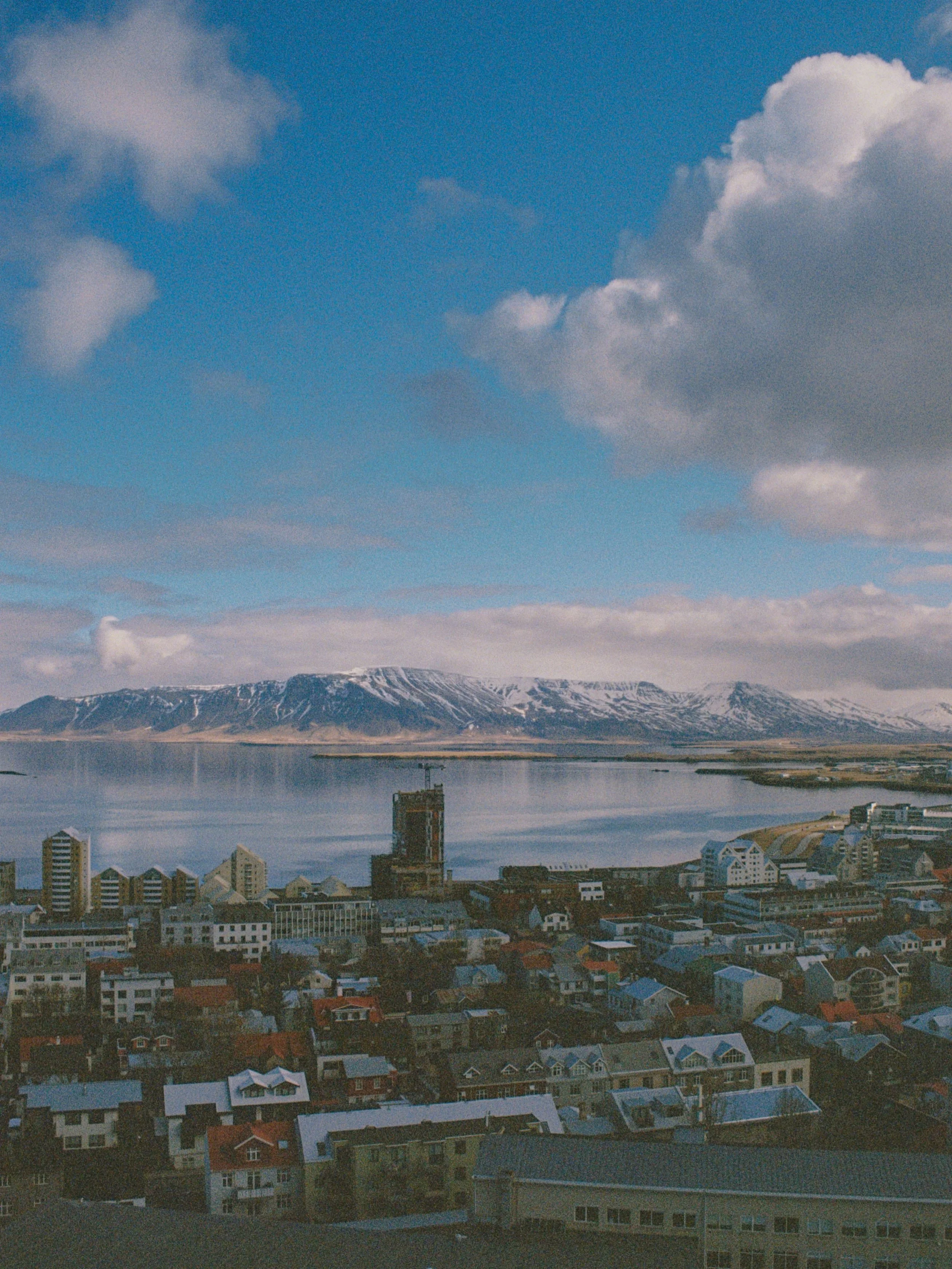 View of Esja from the Hallgr&iacute;mskirkja bell tower. 
Iceland Saga 🇮🇸

#leicar3 #kodakultramax400 #analog #35mmfilm #filmisnotdead