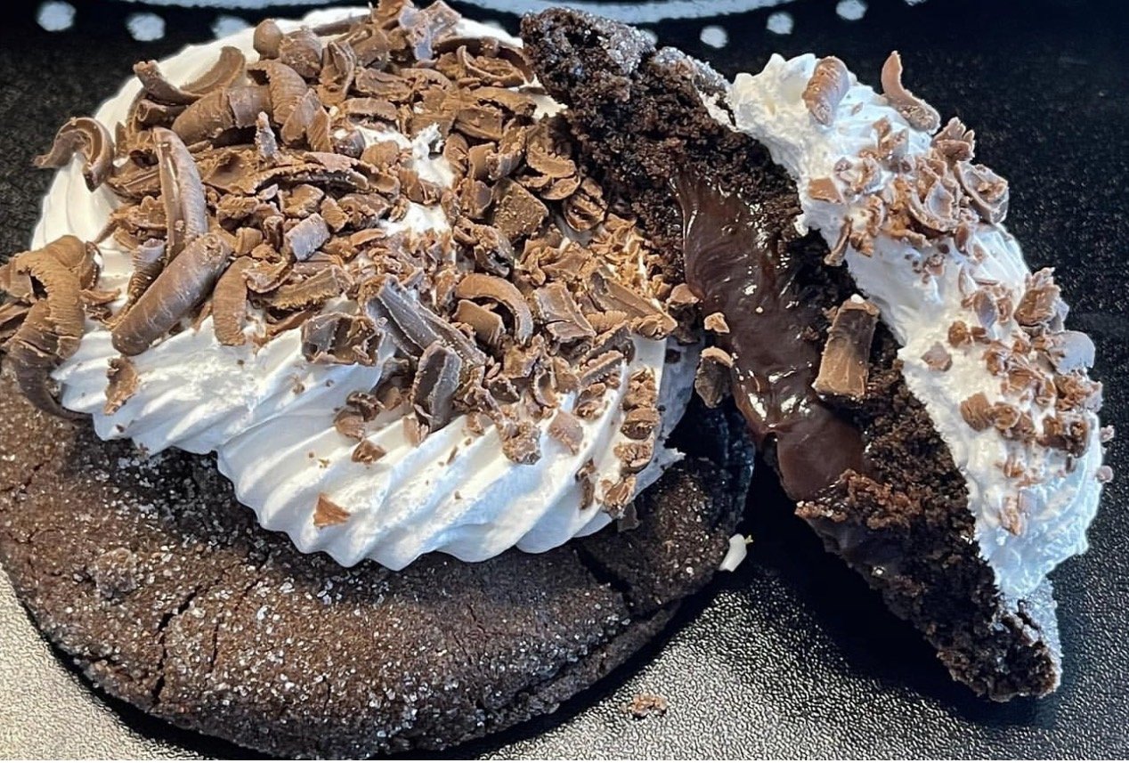 Chocolate cake with marshmallow fluff and chocolate shavings