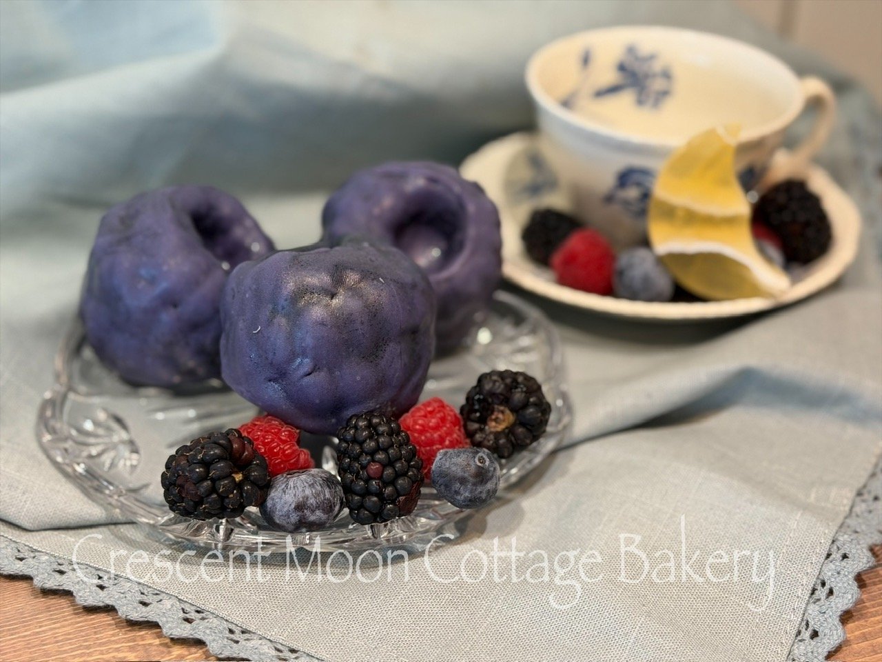 Fresh berry mousse cake made with cream cheese mousse, triple berry compote and cake