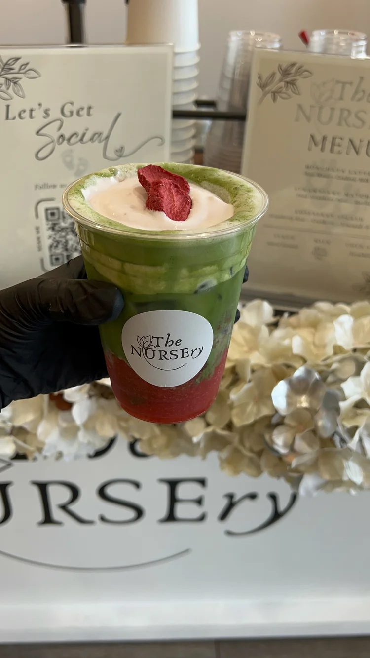 Strawberry matcha topped with a dried strawberry