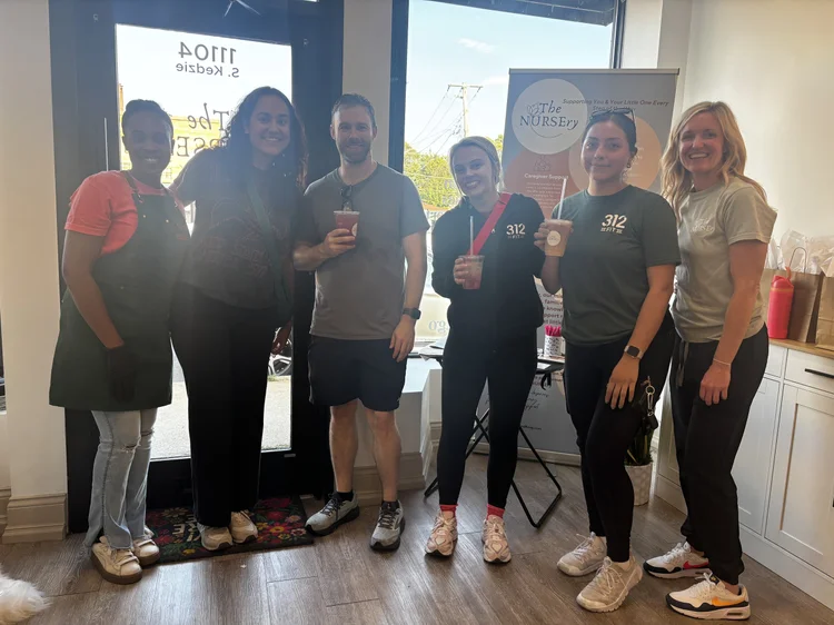 Group of guests with drinks at a Bravo Beans pop-up at The Nursery