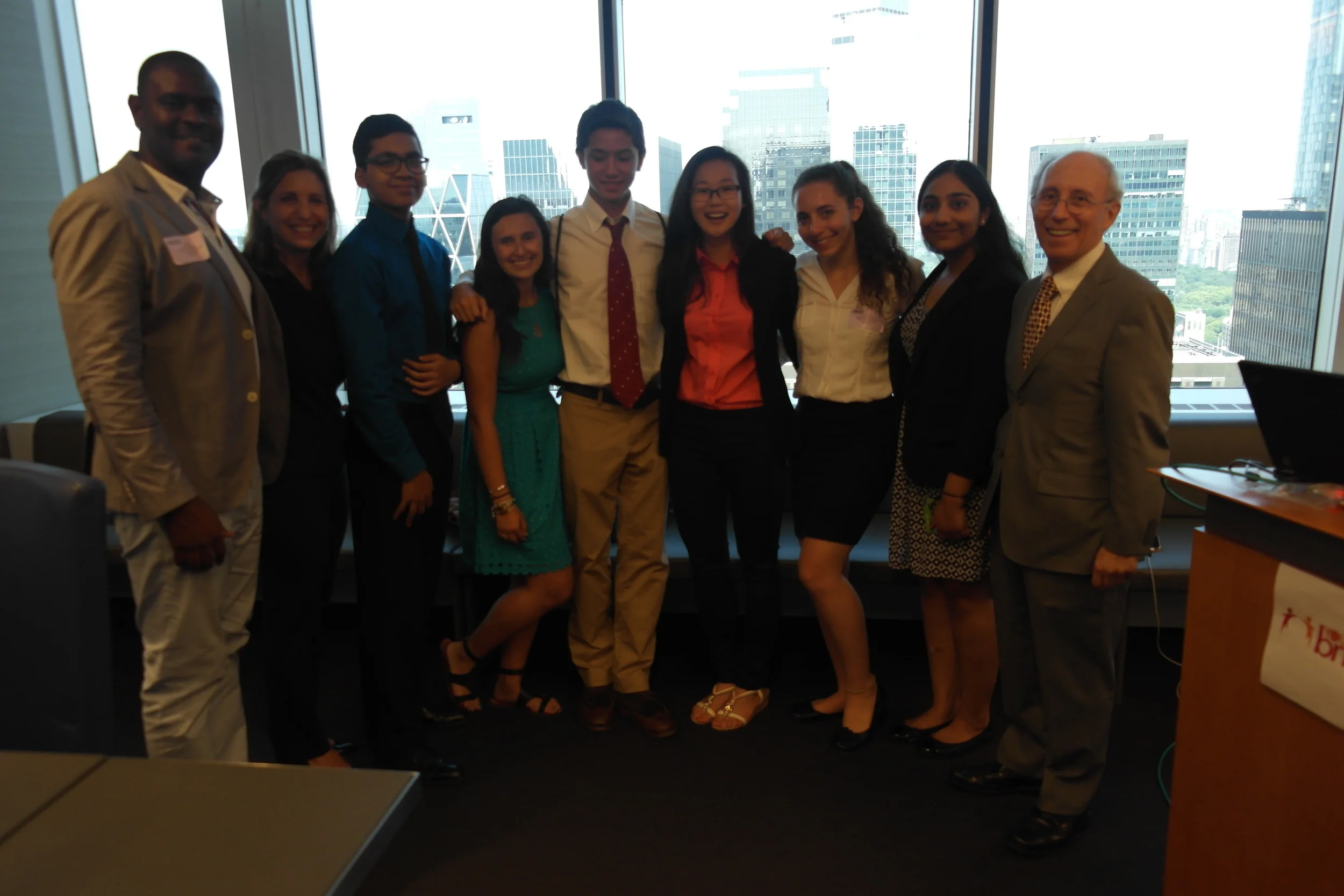 EWD fellows pose with our esteemed judges at the closing luncheon