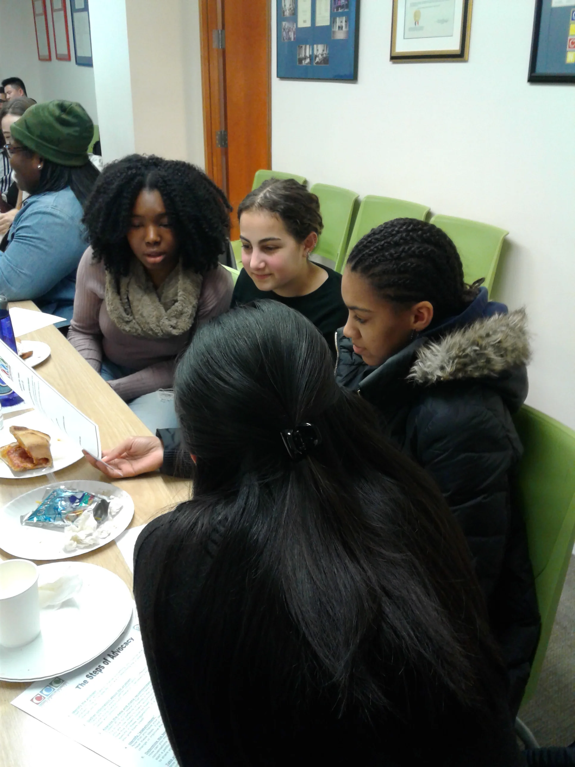 Fellows Abisola, Maggie,&nbsp;Brittany, and Caden discuss advocacy during a breakout session at CCC-NY