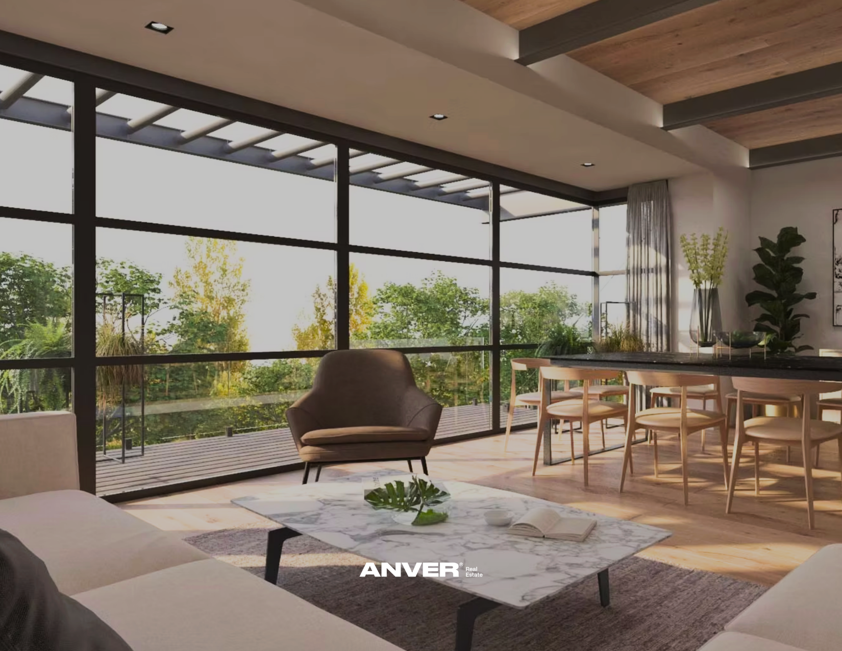 Sala moderna con amplias ventanas y vista a áreas verdes, mobiliario en tonos neutros y plantas decorativas.