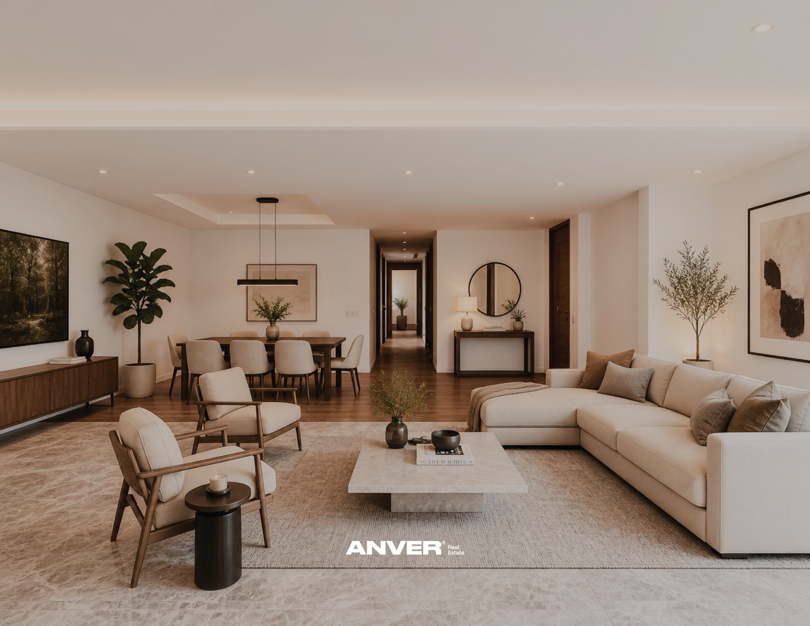 Sala de estar moderna con sofá beige, mesa de centro de piedra, sillas adicionales, decoración minimalista, plantas y cuadros en paredes blancas, iluminación sutil y suelo de madera.