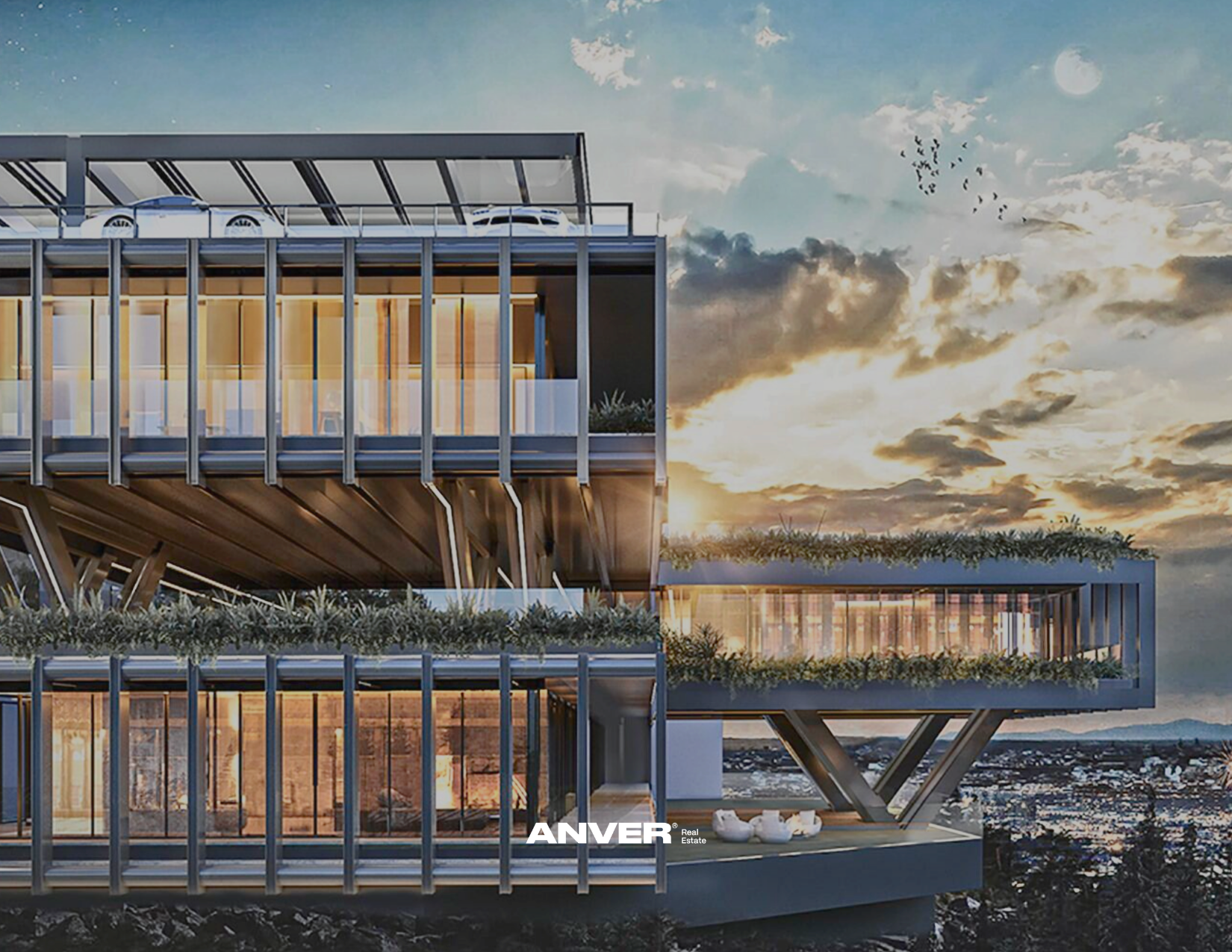 Edificio moderno de múltiples niveles con balcones y zonas ajardinadas, ambientado al atardecer con nubes y luna en el cielo.