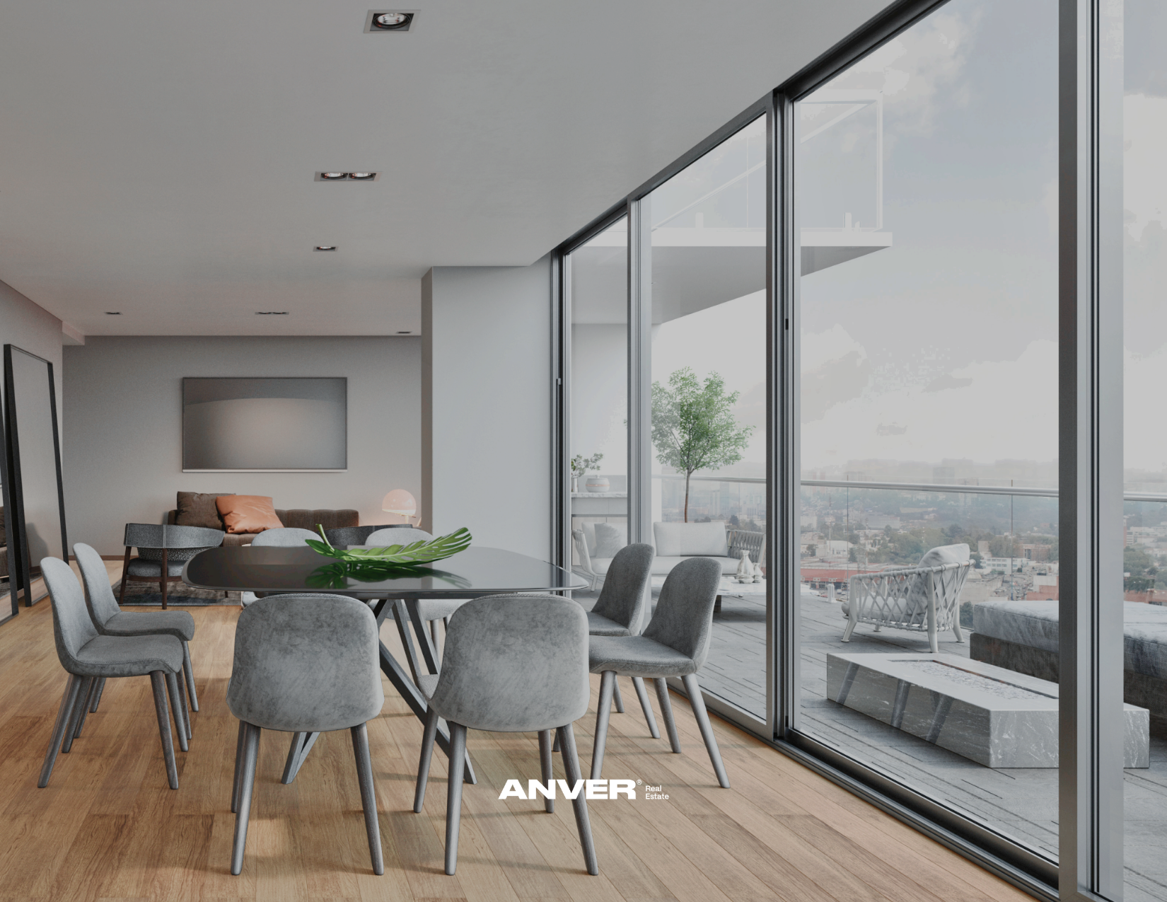 Sala moderna con mesa redonda y sillas grises, vista a un balcón con muebles y vista panorámica de la ciudad