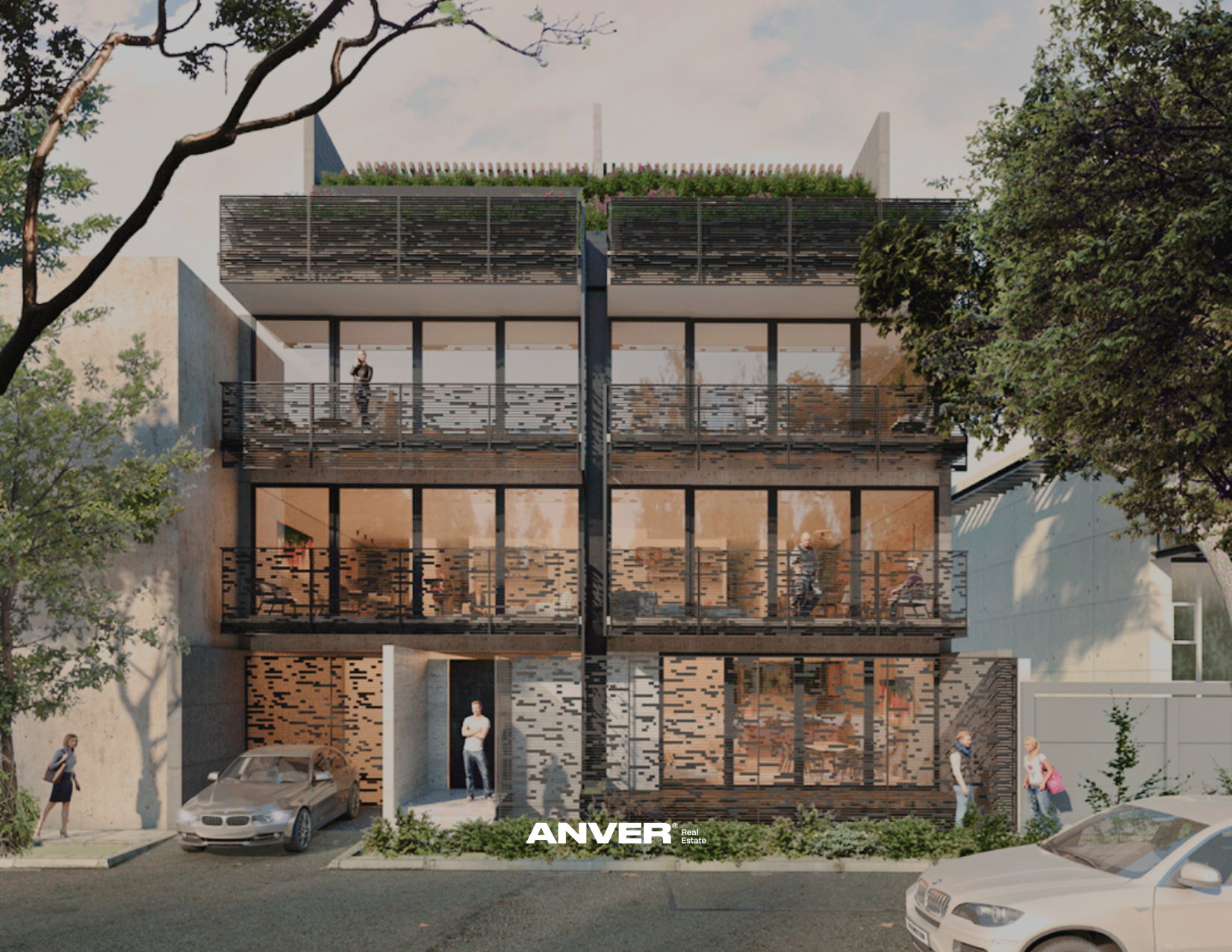 Edificio moderno de varios pisos con balcones de madera y barandales metálicos, y vegetación en la azotea, en una calle con árboles y personas caminando, coches estacionados y del lado derecho un edificio blanco. Logo en la parte inferior que dice 'ANVER' en letras blancas.