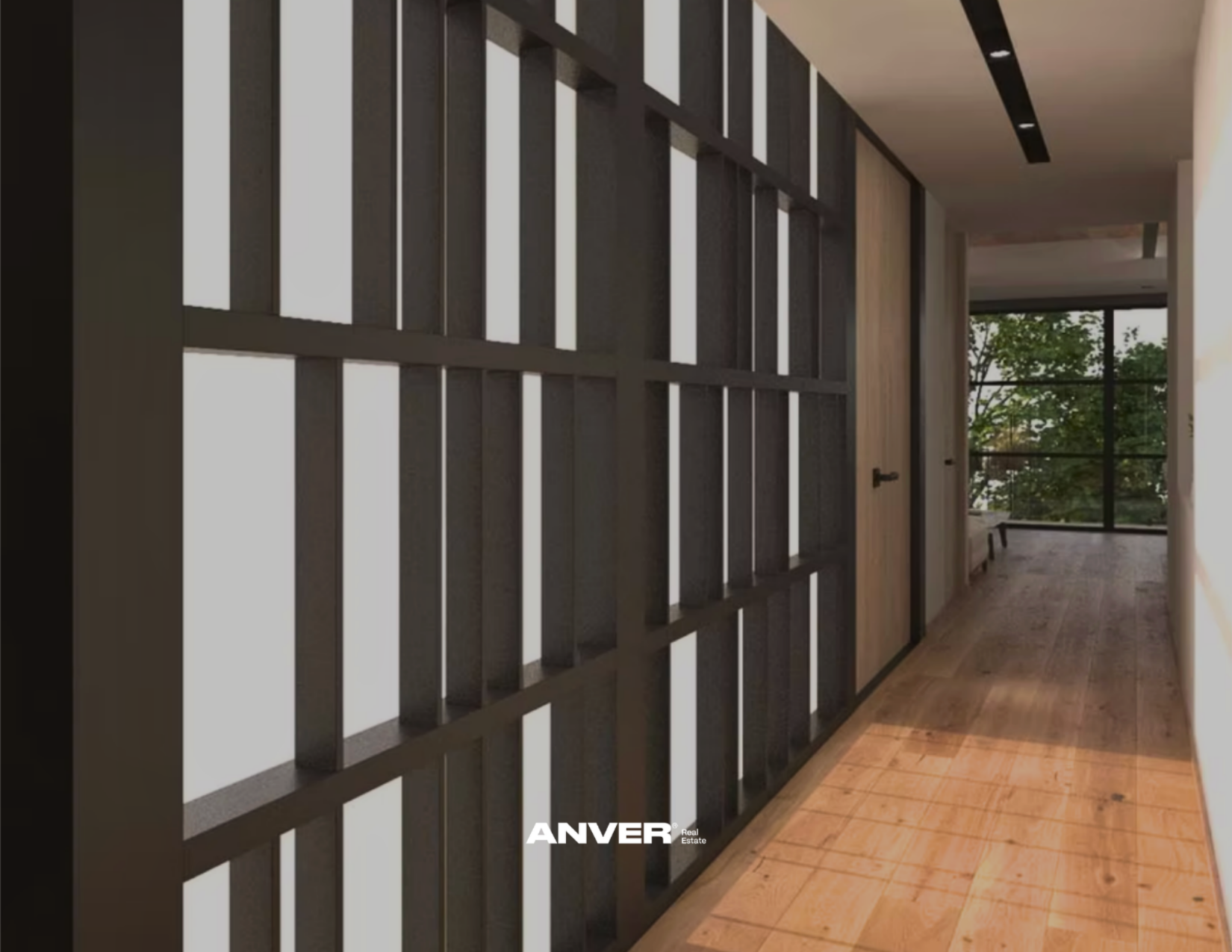 Interiores modernos con pared de madera y ventanas grandes, piso de madera, una sala en el fondo con sillones, iluminación natural y decoración minimalista.