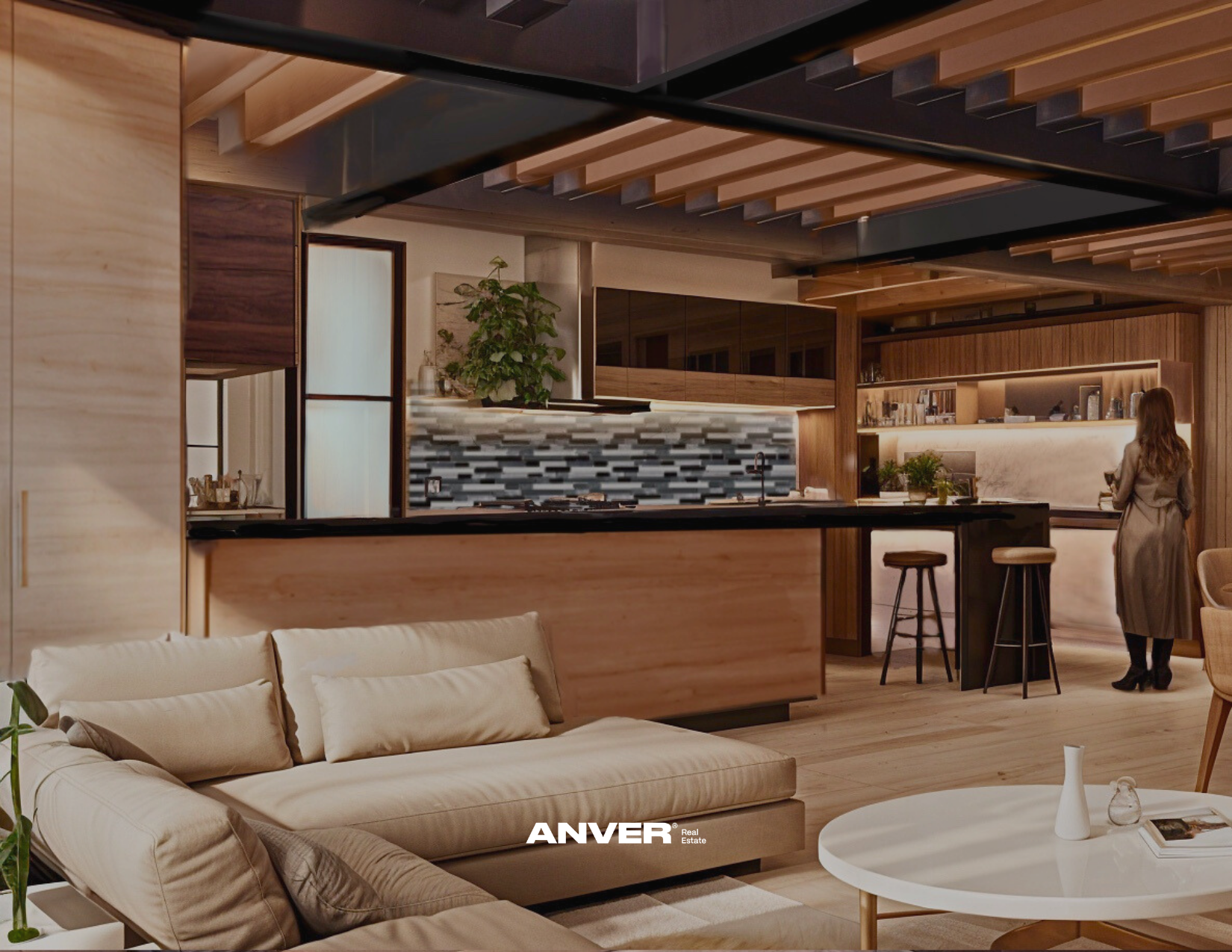 Interior moderno de una sala y cocina con muebles de madera, bar con taburetes, sofá beige y mesa redonda con accesorios decorativos.