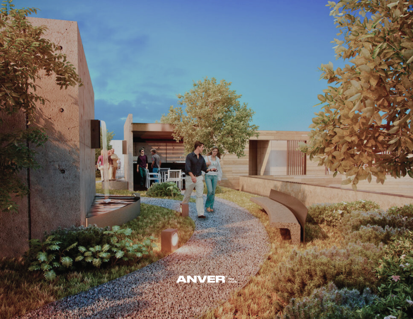 Personas caminando por un jardín con caminos de gravilla, cerca de mobiliario y vegetación, en un espacio que parece ser un área recreativa o de descanso, con un edificio moderno de fondo y árboles a los lados.