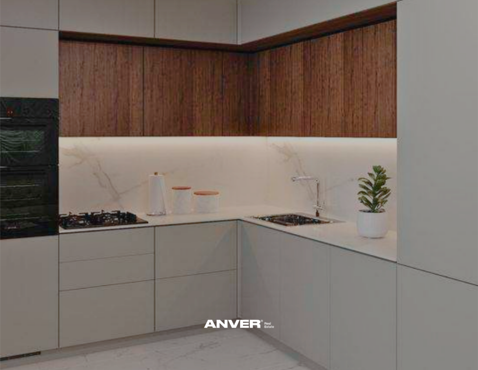 Cocina moderna con gabinetes blancos, encimera de mármol blanco, estufa de gas, vasos apilados y planta en una maceta.