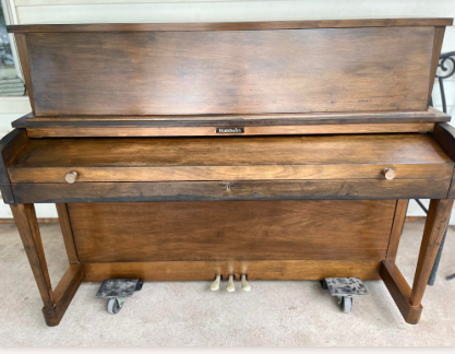 Baldwin Hamilton after a complete restoration! This piano got a beautiful ebony stain that came out fantastic. 