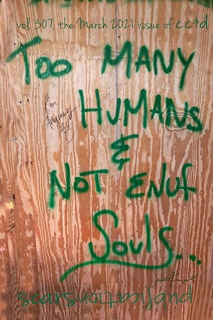 literary journal cover with green spray paint on wood grain wall