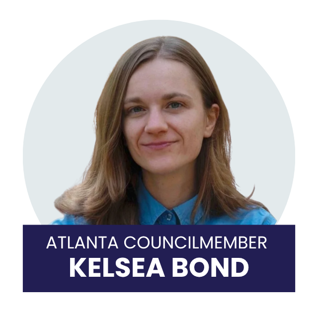 Portrait of Kelsea Bond, an Atlanta City Councilmember, with brown hair, wearing a blue collared shirt, smiling against a light background.