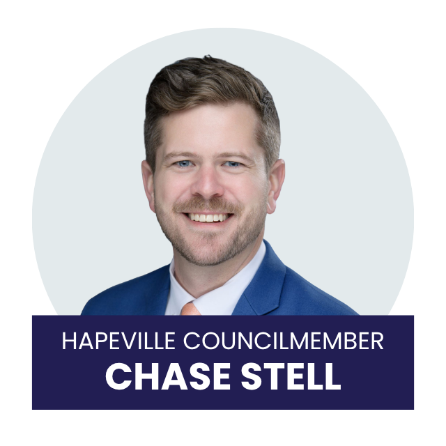 A professional headshot of Chase Stell, a man with light brown hair, blue eyes, and a beard, wearing a navy blue suit, white shirt, and peach tie, smiling against a light background with a dark purple banner at the bottom that reads 'Hapeville Councilmember Chase Stell'.