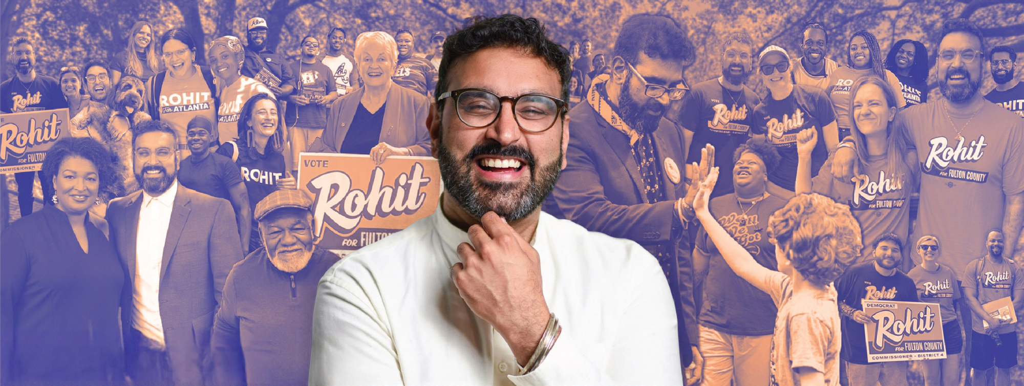 Rohit Malhotra with glasses and a beard wearing a white shirt, superimposed in front of a group of people holding campaign signs for Rohit in an outdoor setting.