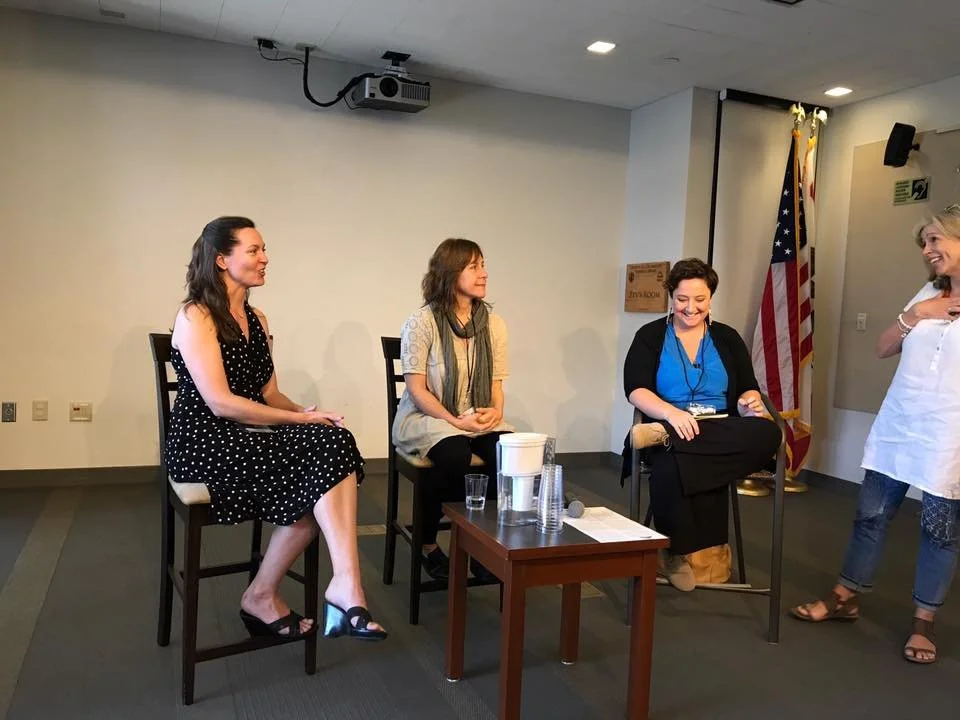 Lauren Polly speaking on a literary panel discussing mental health, creativity, and identity