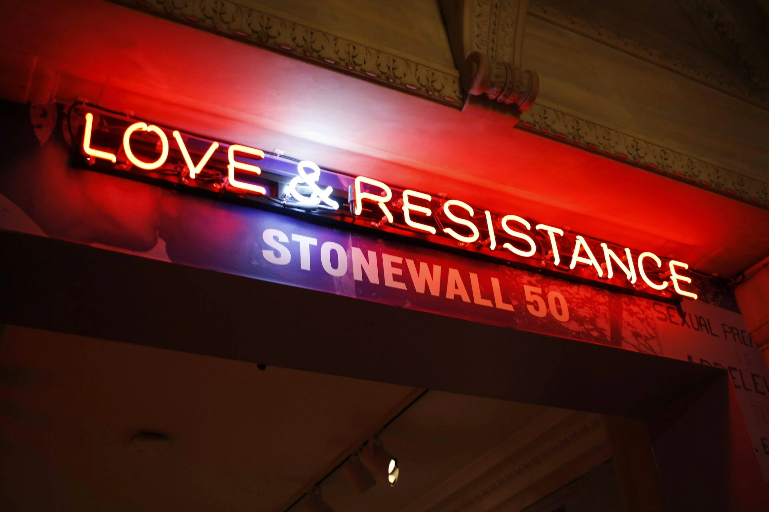 Love and Resistance Stonewall 50 neon sign, Visible LGBTQ+ pride travel trip