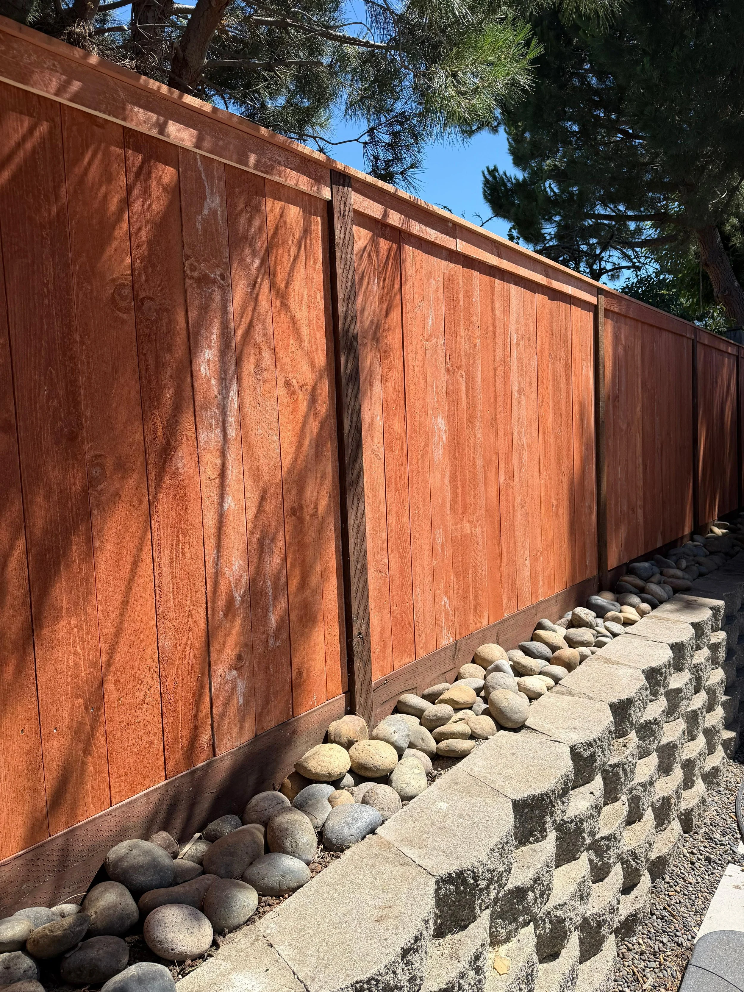 Frame behind vertical fence