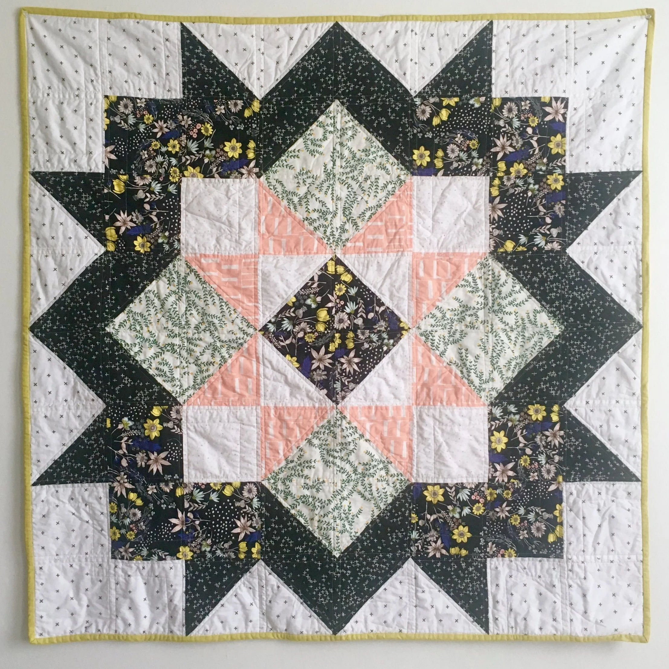 Black, white and floral Star quilt