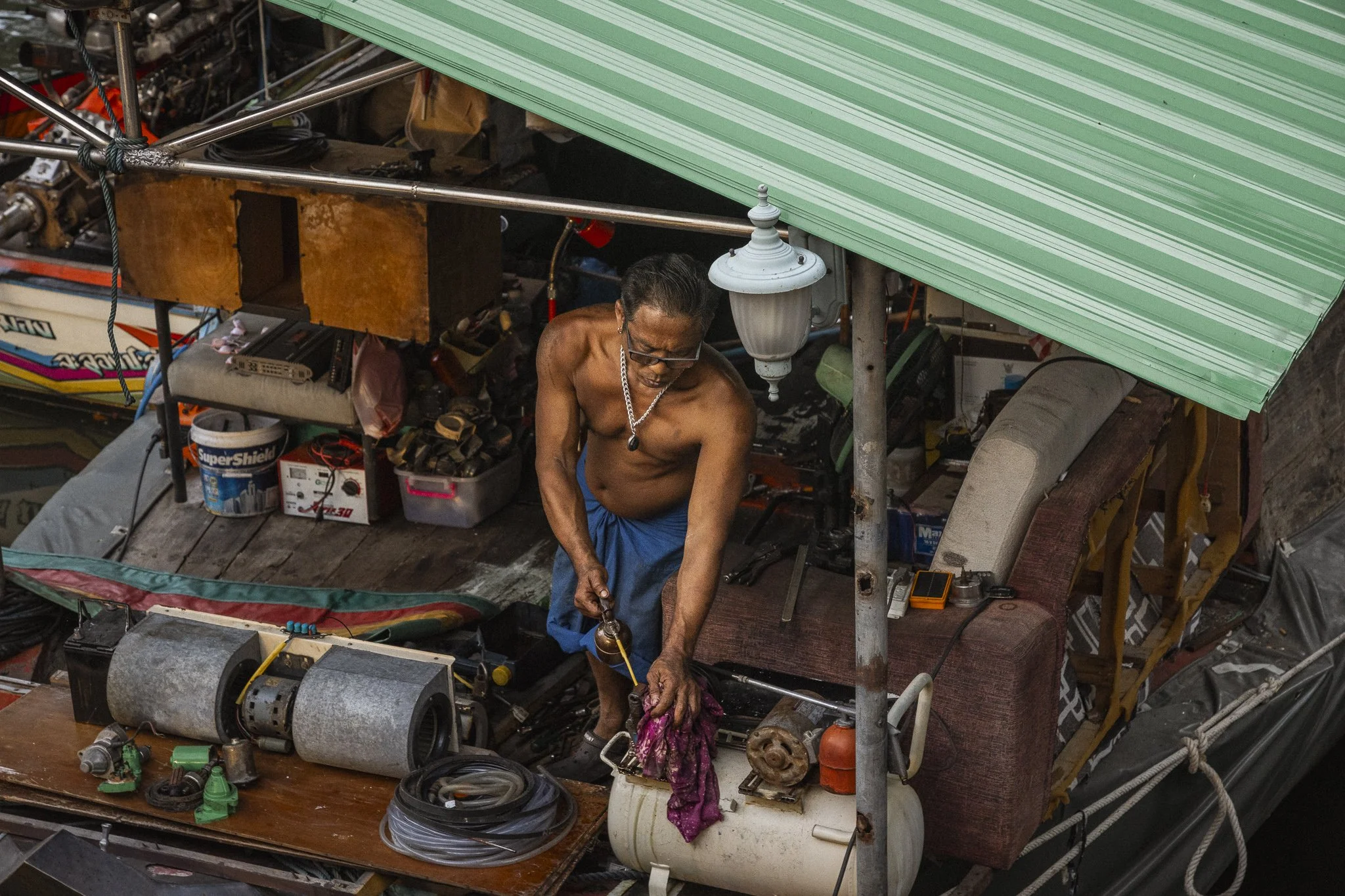 His office has a view. Bangkok, Thailand. 2025.