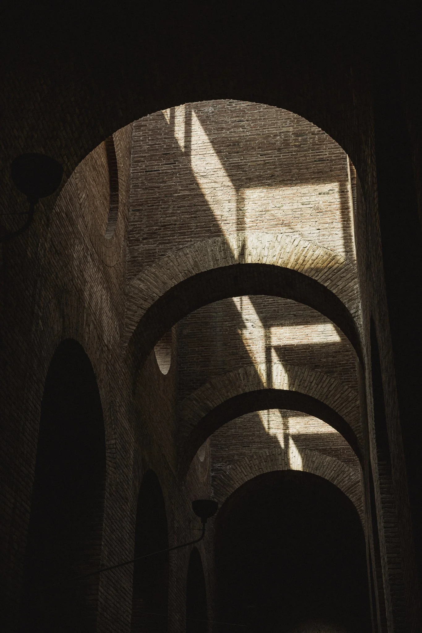 Arches and light at the cistern del aigues in barcelona