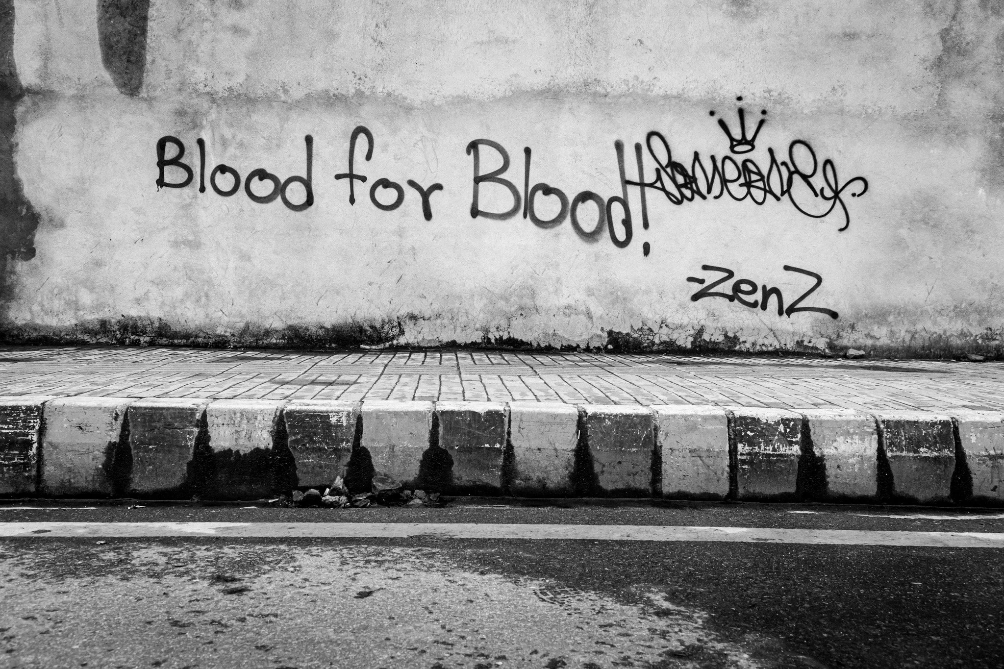 The wall remembers. The government would rather it didn't.