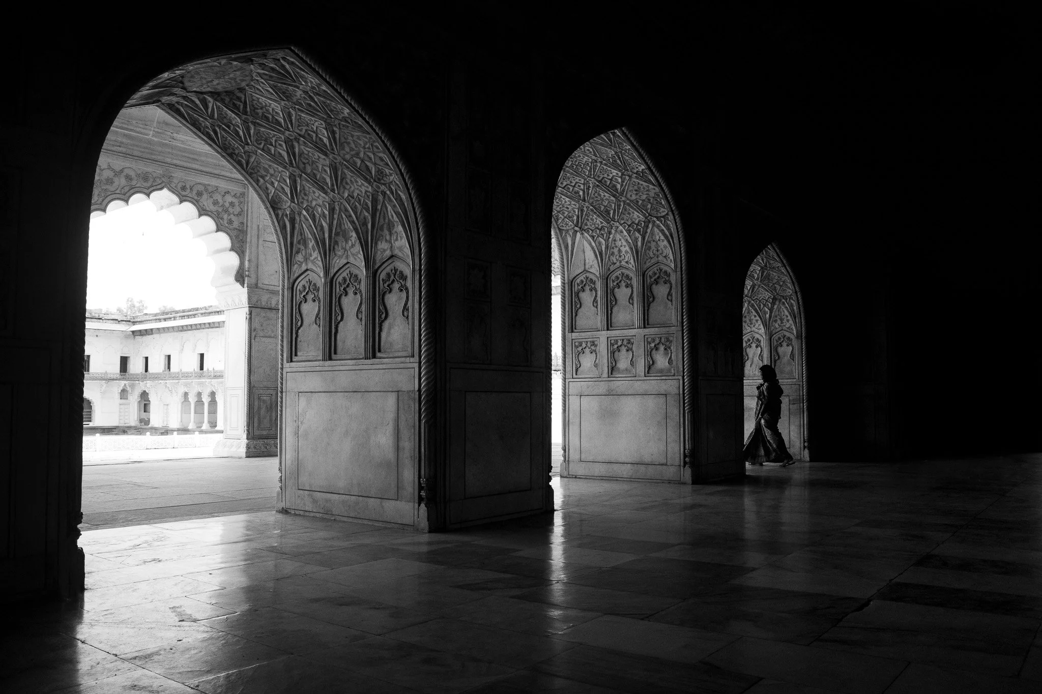 She passed through without stopping. The building had been waiting four hundred years.