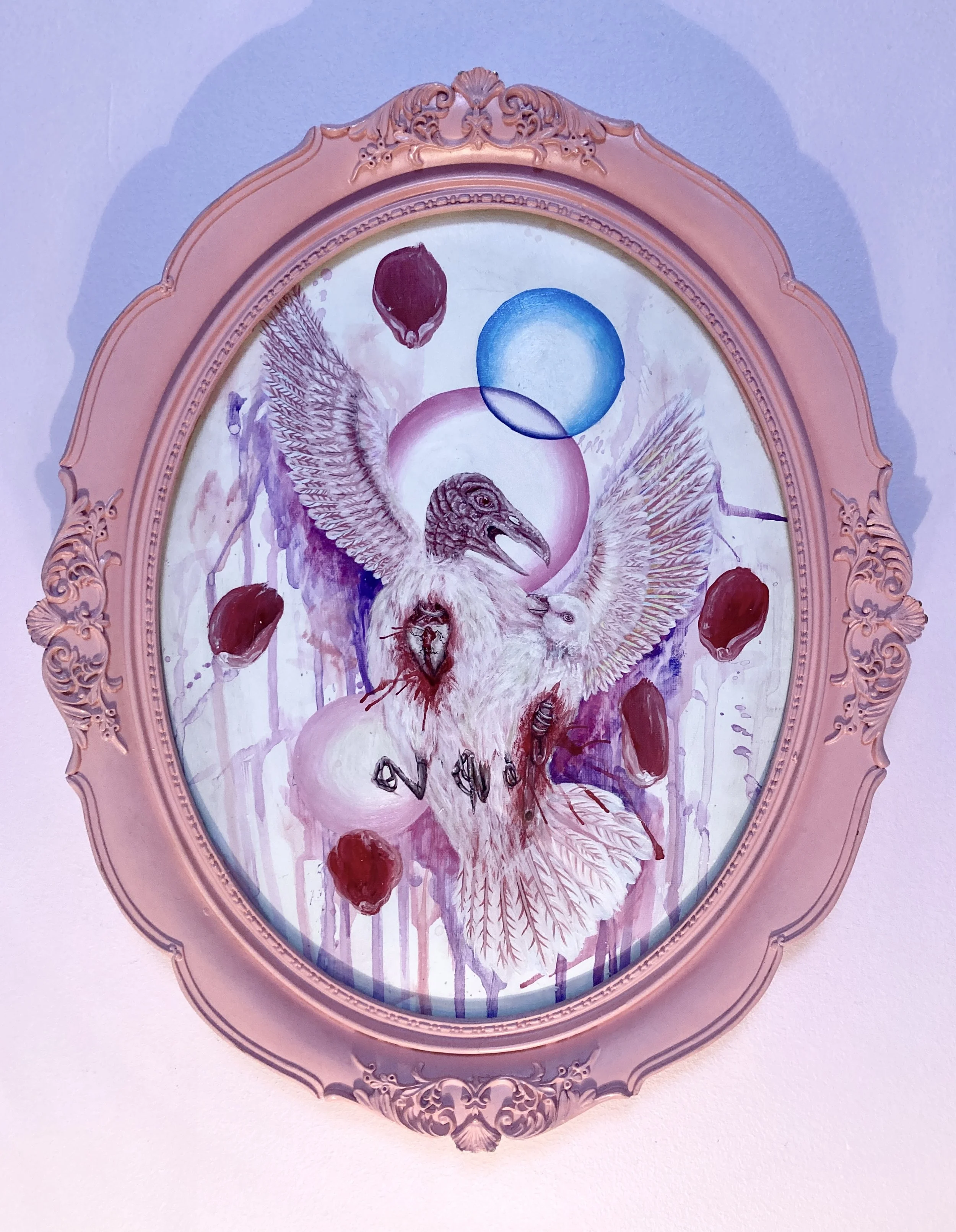 Decorative framed artwork featuring a winged creature a dove and vulture's head and body, surrounded by red circles and abstract purple circles on a pastel background.