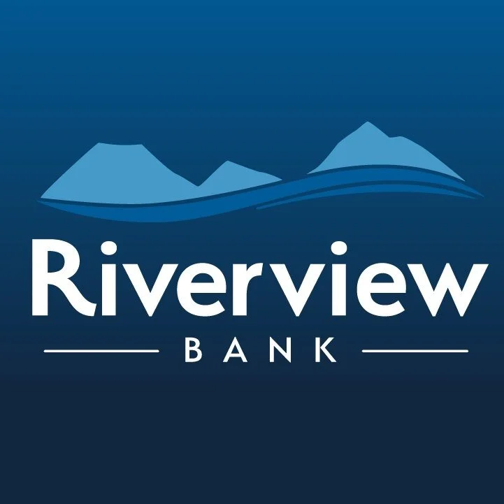 Logo of Riverview Bank featuring blue mountains and the bank's name.