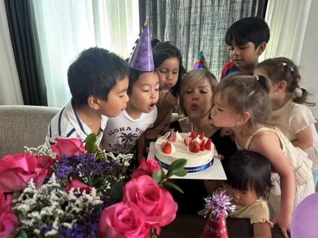 Preschool children celebrating a birthday together with their teacher at BabeeShark Home Daycare and Preschool in Sacramento