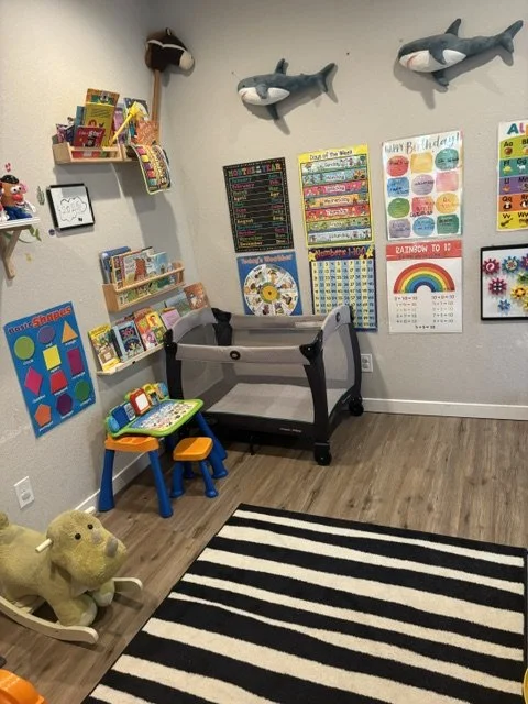 Cozy preschool reading corner with bookshelves, educational toys, and learning materials